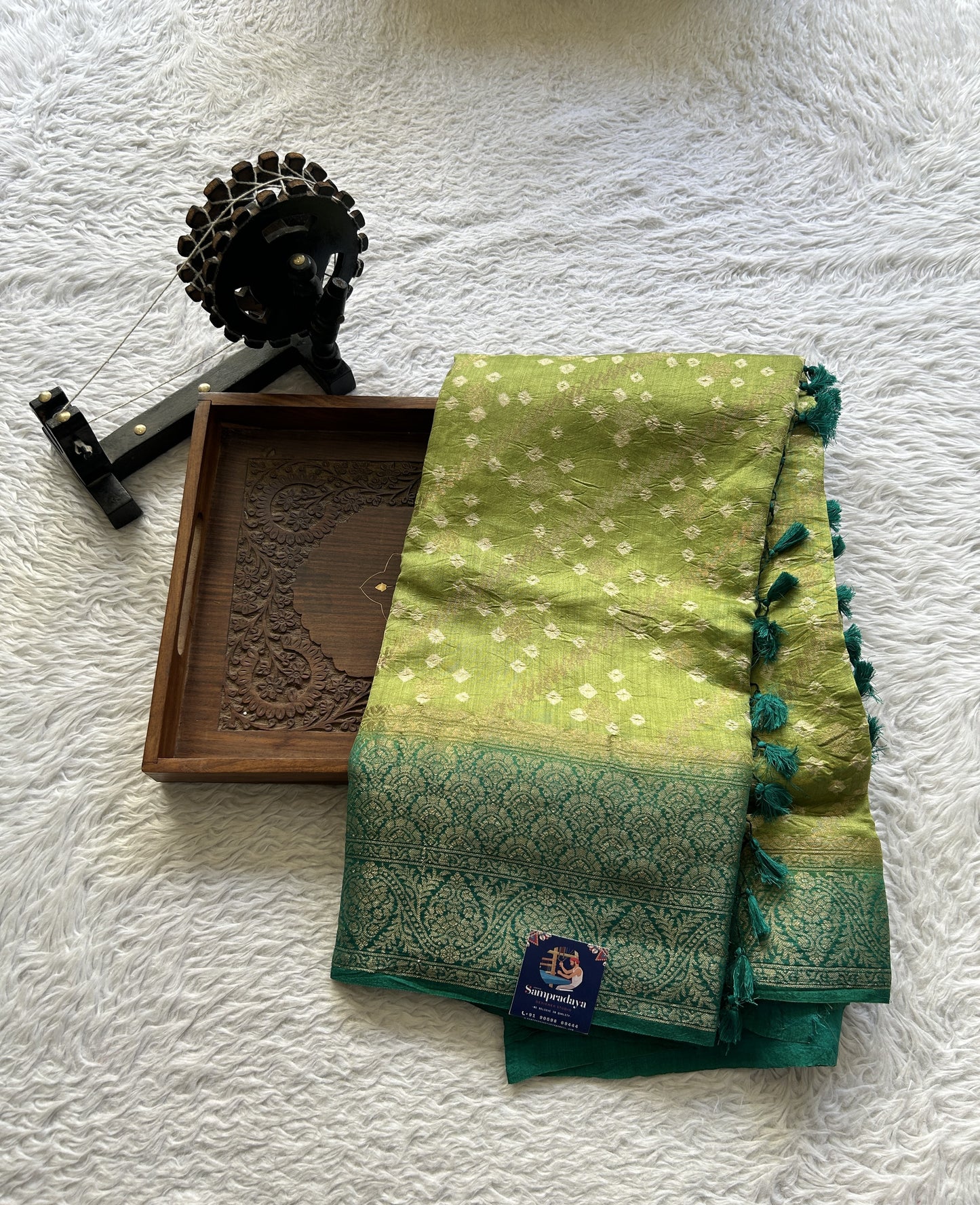 Bandhani Saree Light Green Colored Elegantly Paired with aGreen Color Zari Border. - Sampradaya Designer Studio