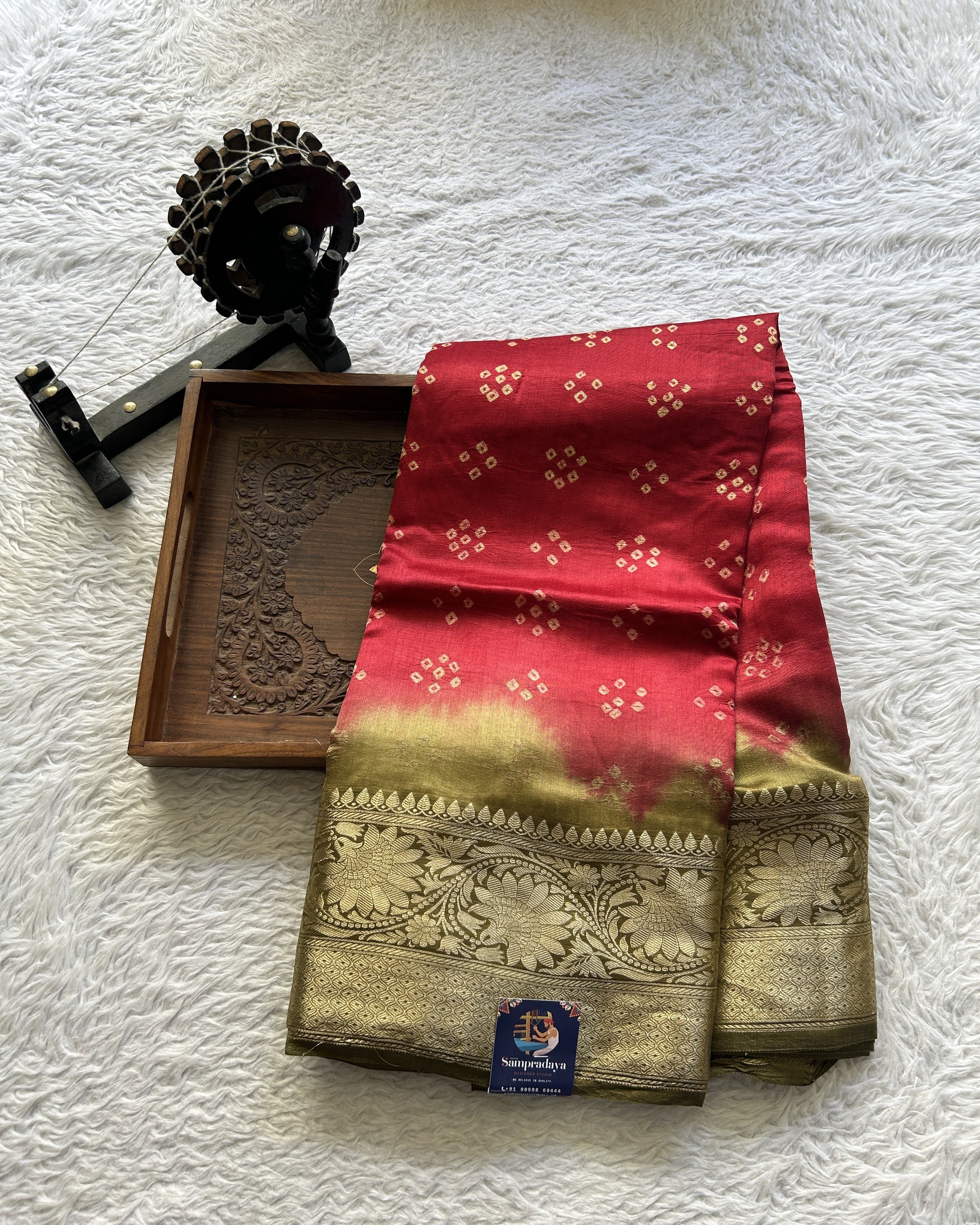Bandhani Saree Red Colored Elegantly Paired with a Olive Green Color Zari Border. - Sampradaya Designer Studio