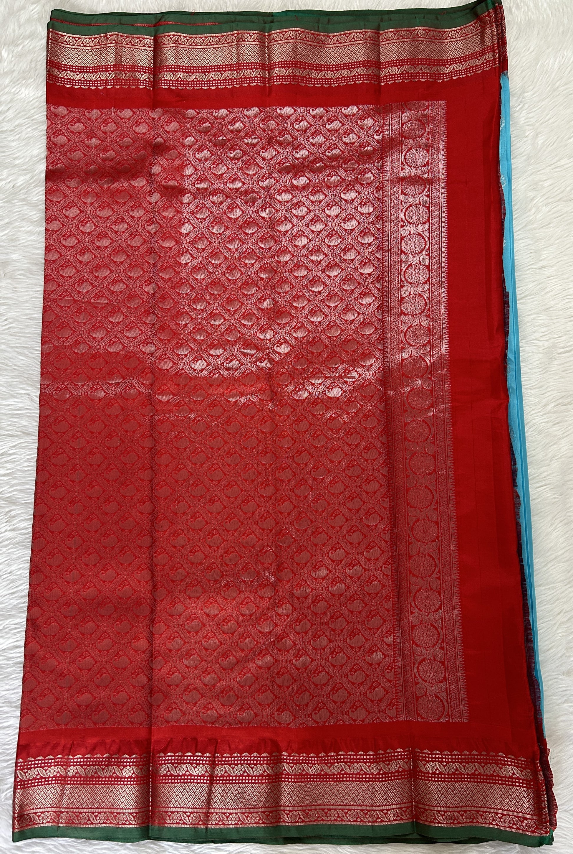Gadwal Pattu Saree Sky Blue colored saree complemented with a Dark Red Kanchi Border - Sampradaya Designer Studio
