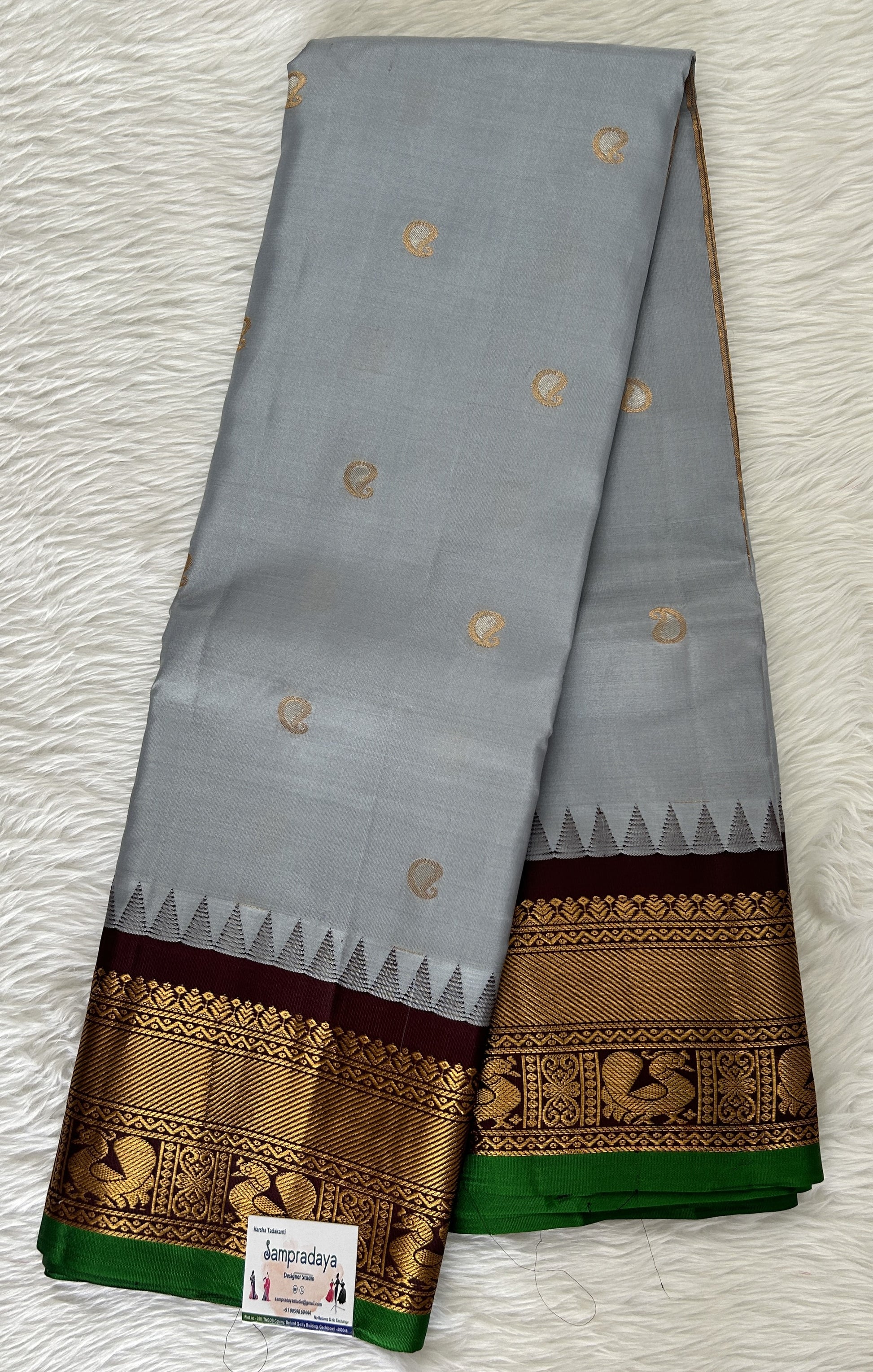 Gadwal Pattu Saree Light Gray colored saree complemented with a Brown Kanchi Border - Sampradaya Designer Studio