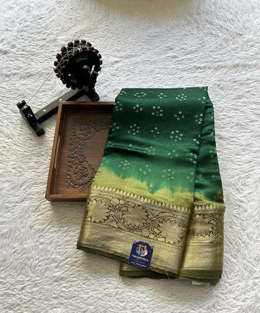 Bandhani Saree Dark Green Colored Elegantly Paired with a Olive Green Color Zari Border. - Sampradaya Designer Studio