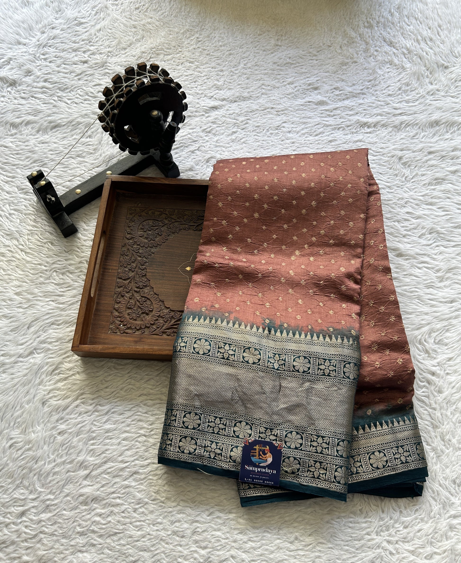 Bandhani Saree Rust Colored Elegantly Paired with a Teal Blue Color Zari Border. - Sampradaya Designer Studio