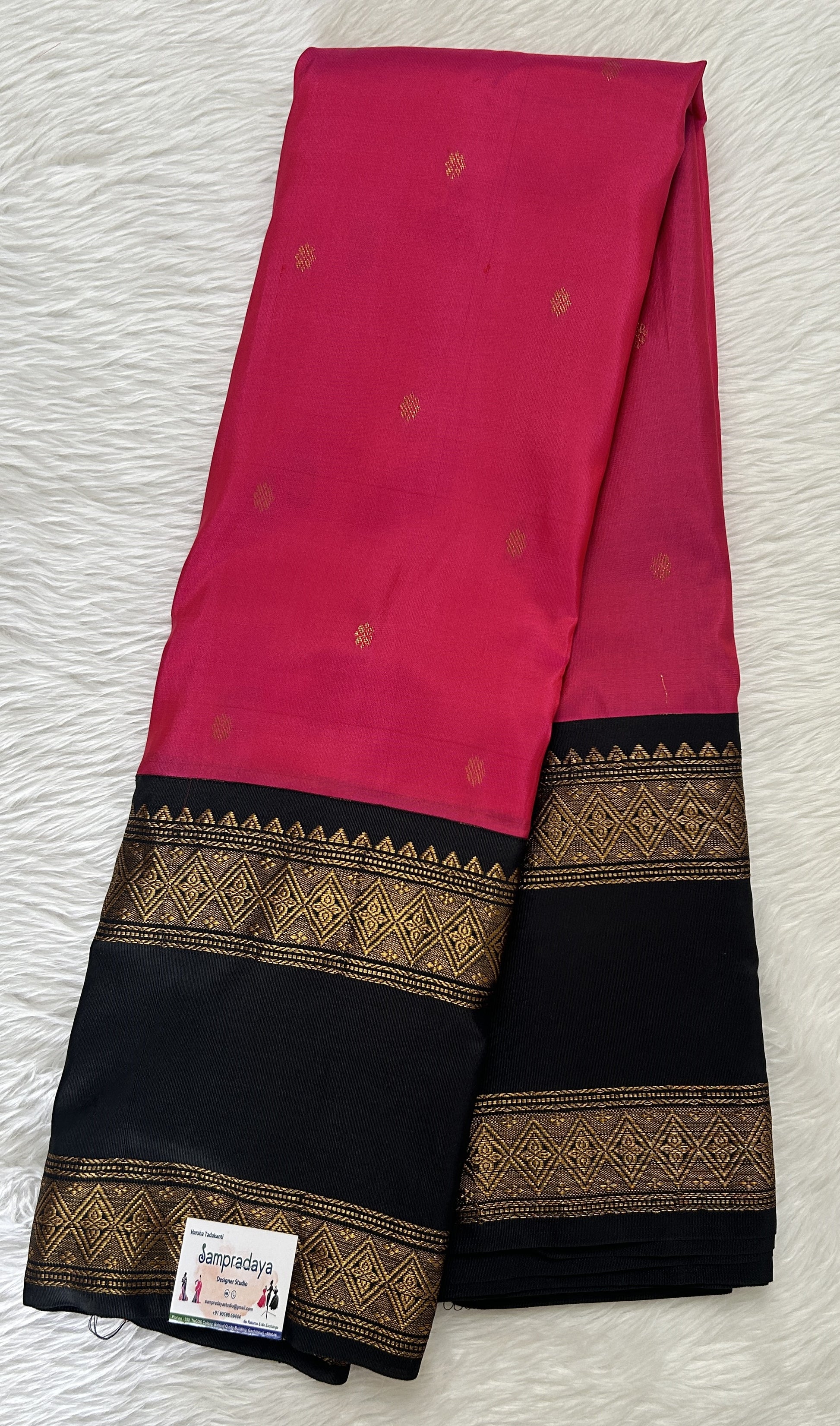 Gadwal Pattu Saree Pink colored saree complemented with a Black Kanchi Border - Sampradaya Designer Studio