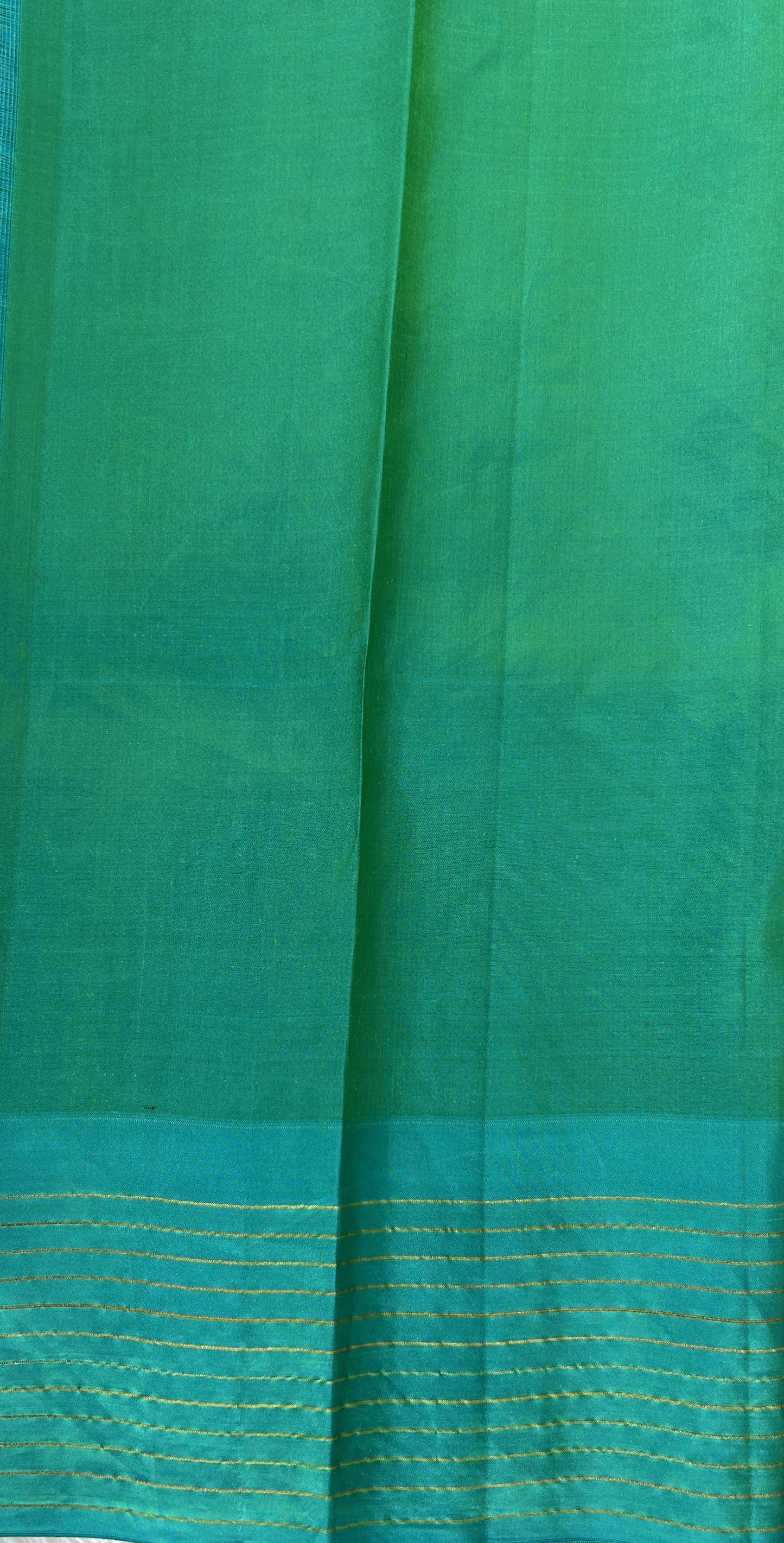 Gadwal Pattu Saree Purple colored saree complemented with a Turquoise Blue Checks Border - Sampradaya Designer Studio