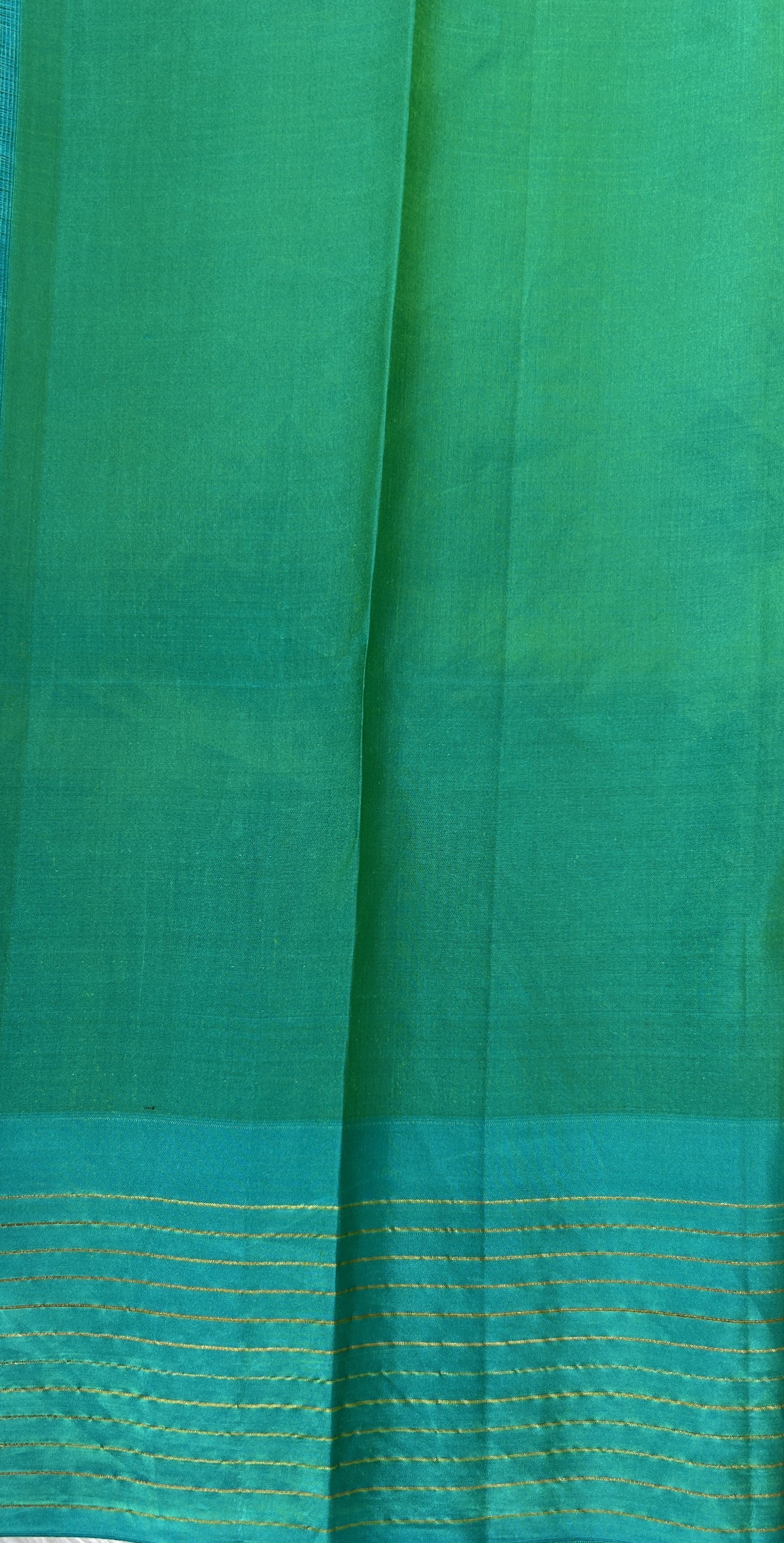 Gadwal Pattu Saree Purple colored saree complemented with a Turquoise Blue Checks Border - Sampradaya Designer Studio