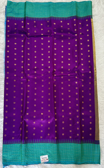 Gadwal Pattu Saree Purple colored saree complemented with a Turquoise Blue Checks Border - Sampradaya Designer Studio