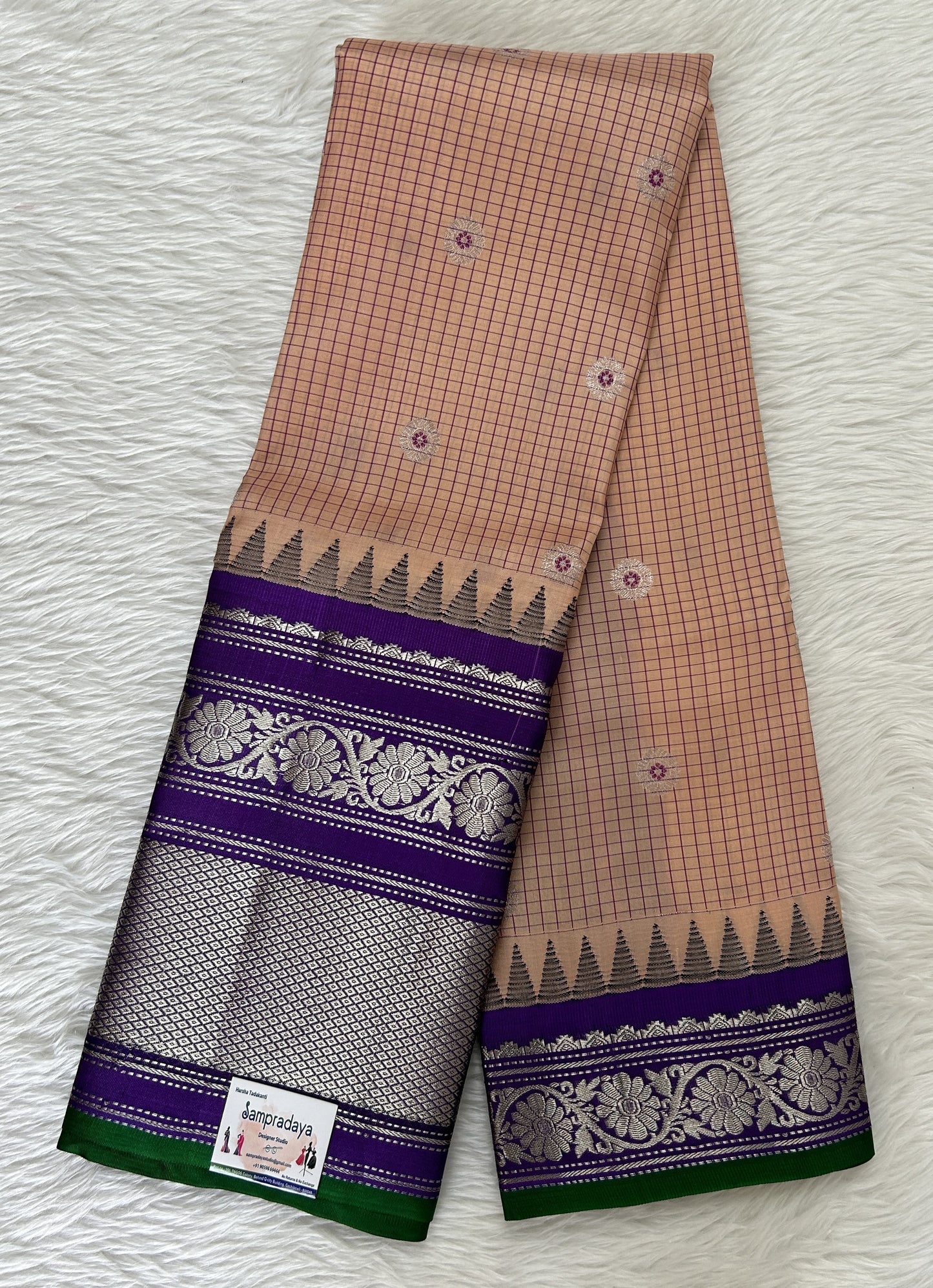 Gadwal Pattu Saree Light Peach colored saree complemented with a Violet Kanchi Border - Sampradaya Designer Studio