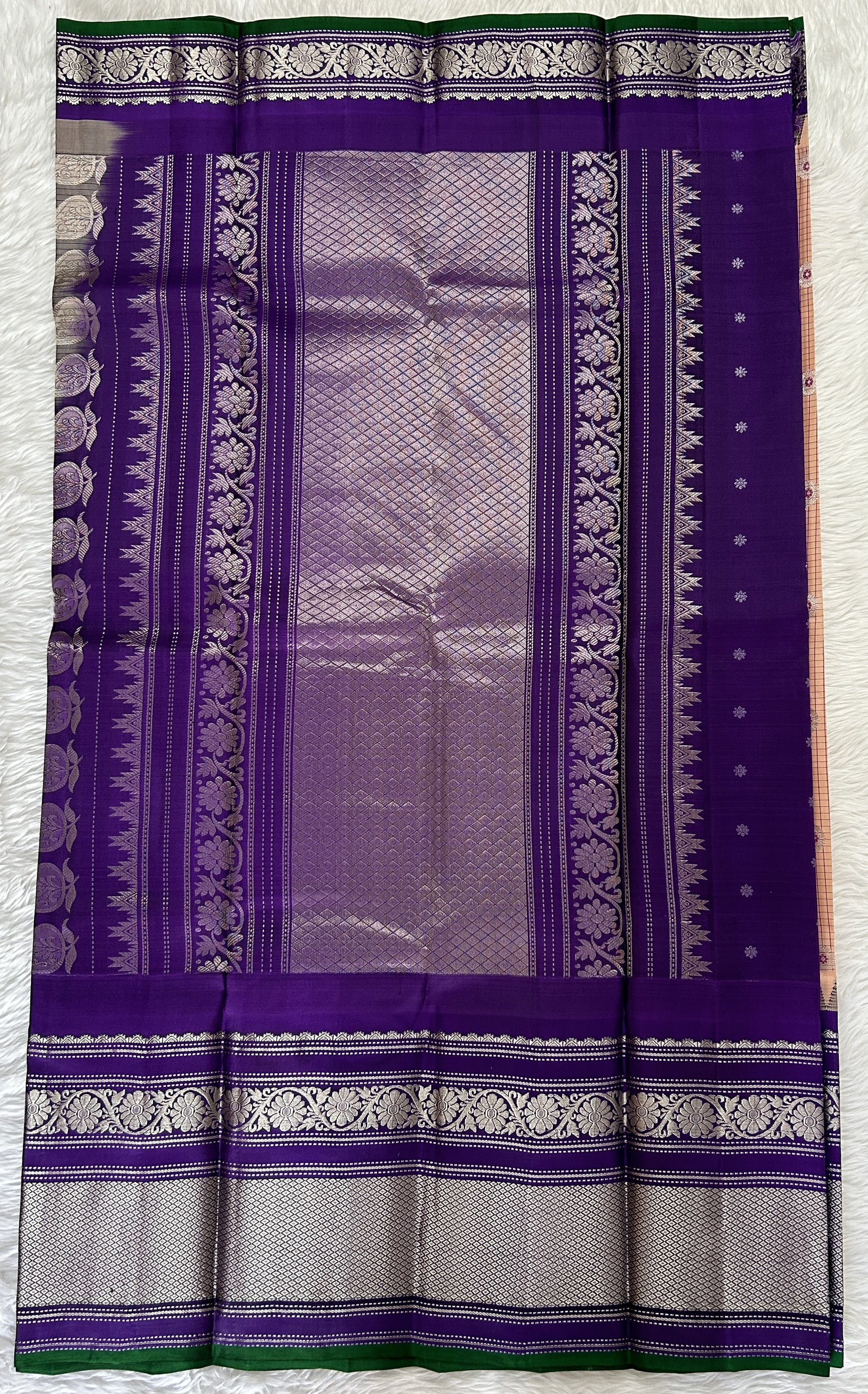 Gadwal Pattu Saree Light Peach colored saree complemented with a Violet Kanchi Border - Sampradaya Designer Studio