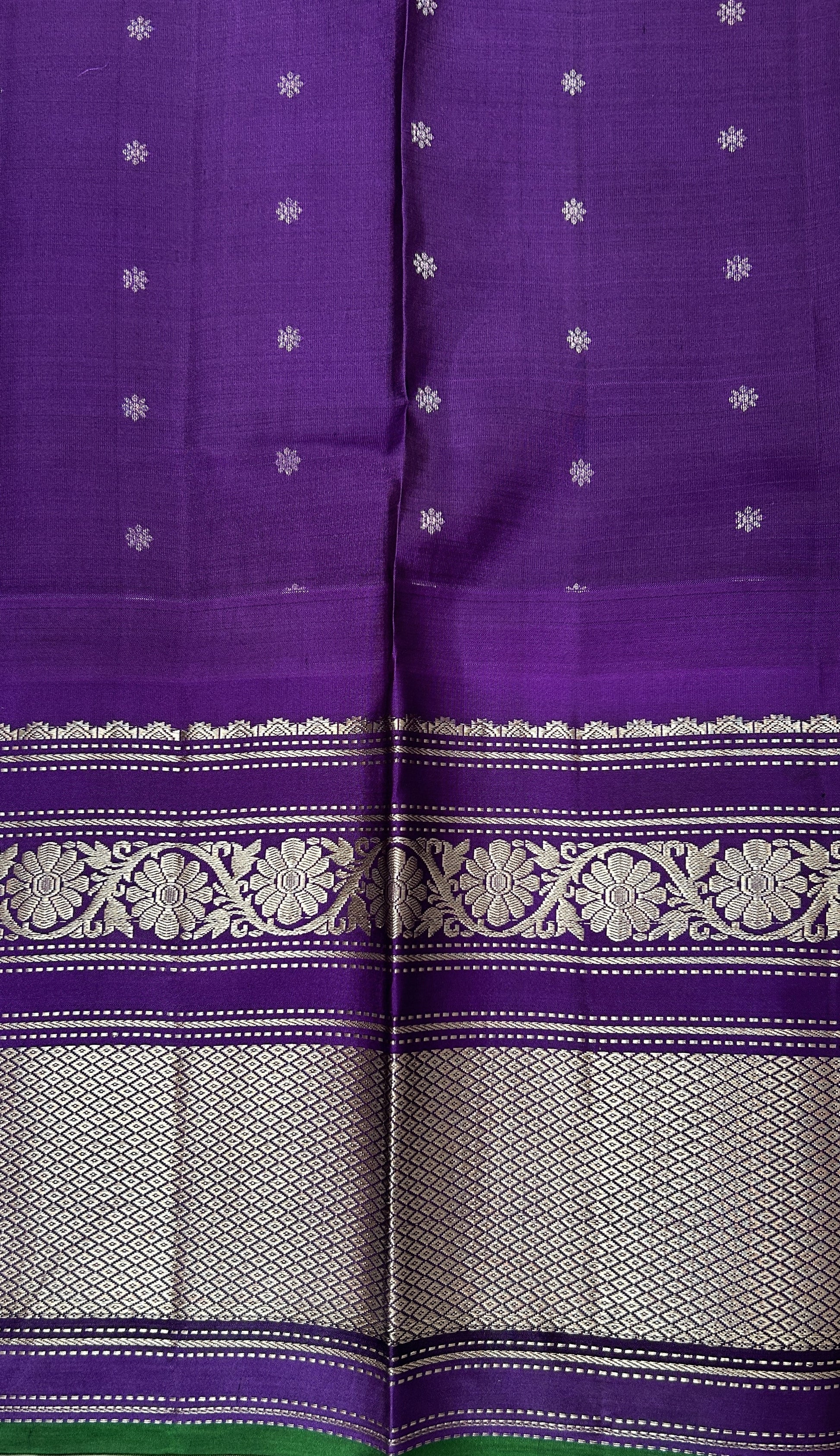 Gadwal Pattu Saree Light Peach colored saree complemented with a Violet Kanchi Border - Sampradaya Designer Studio