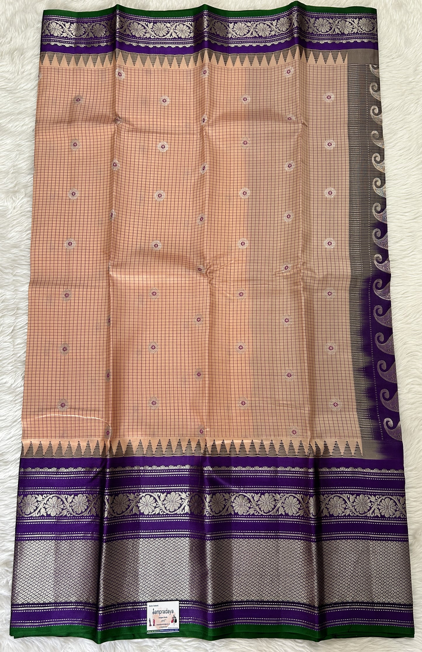 Gadwal Pattu Saree Light Peach colored saree complemented with a Violet Kanchi Border - Sampradaya Designer Studio