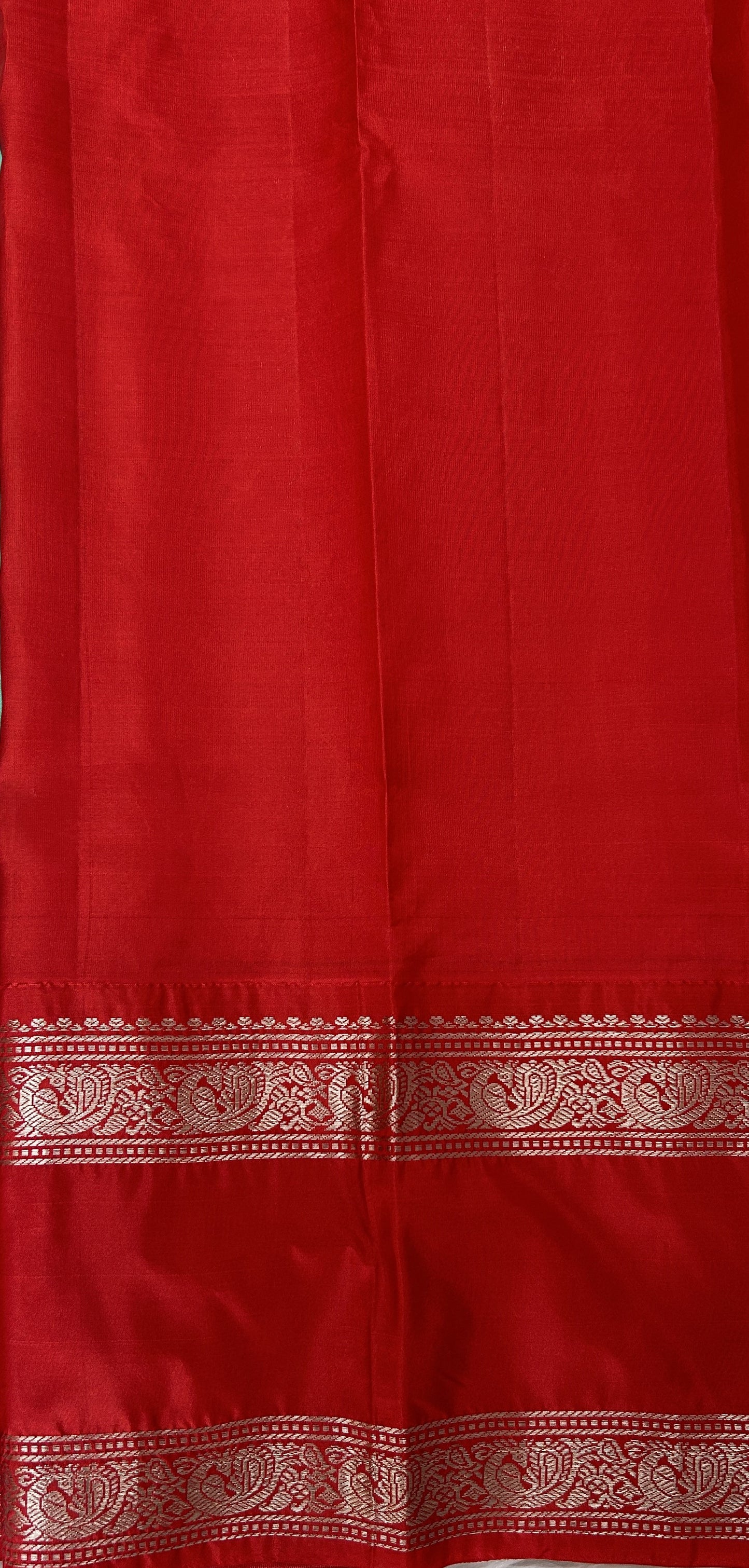 Gadwal Pattu Saree Mint Green colored saree complemented with a Red Kanchi Gap Border - Sampradaya Designer Studio