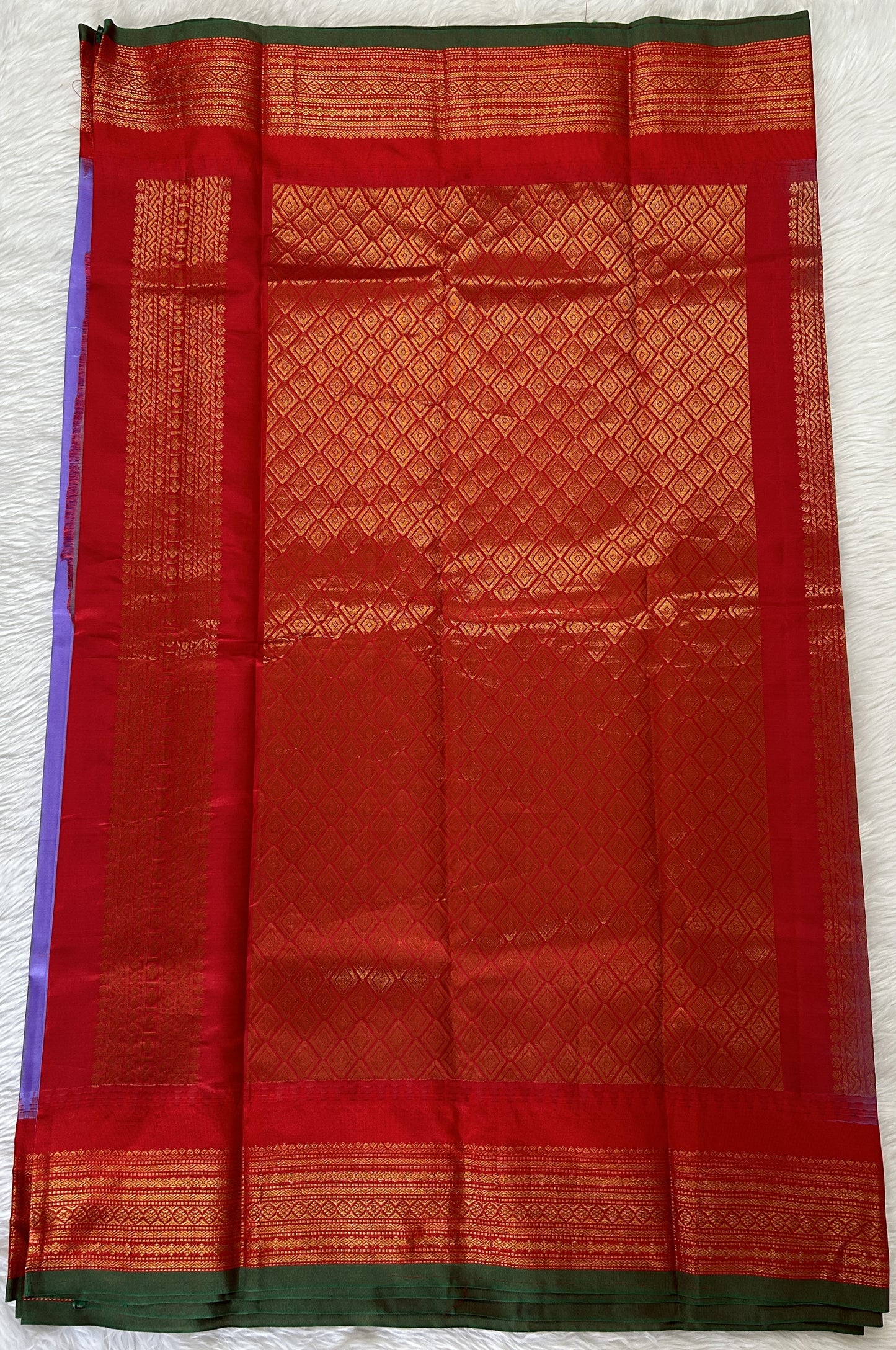 Gadwal Pattu Saree Lavender colored saree complemented with a Red Kanchi Border - Sampradaya Designer Studio
