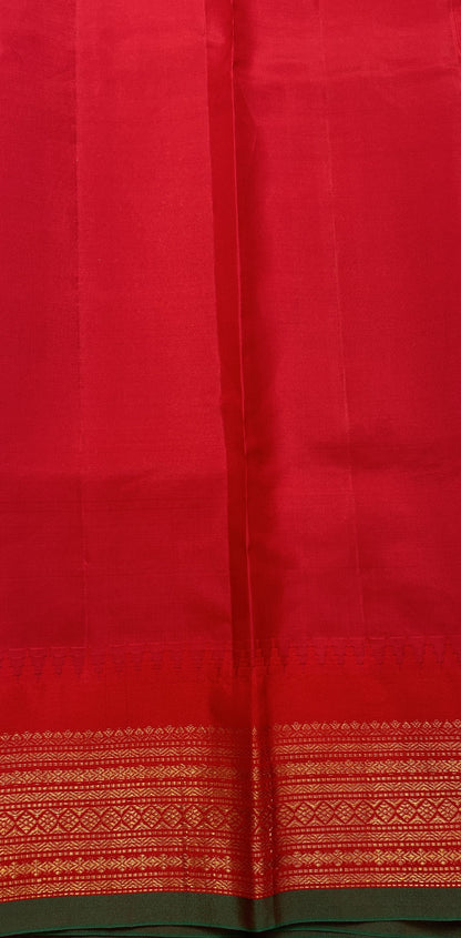 Gadwal Pattu Saree Lavender colored saree complemented with a Red Kanchi Border - Sampradaya Designer Studio