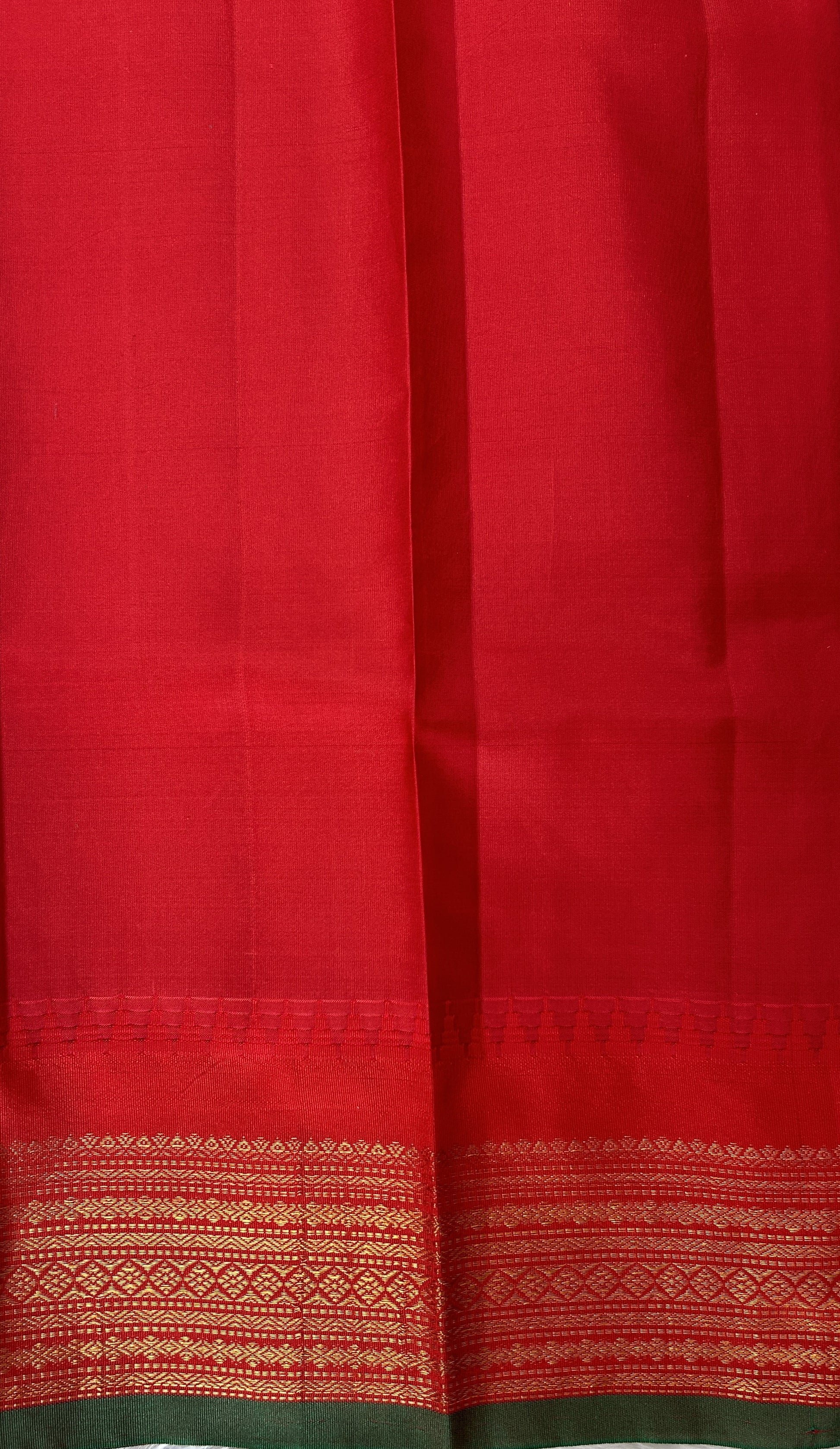Gadwal Pattu Saree Dark Green colored saree complemented with a Red Kanchi Border - Sampradaya Designer Studio