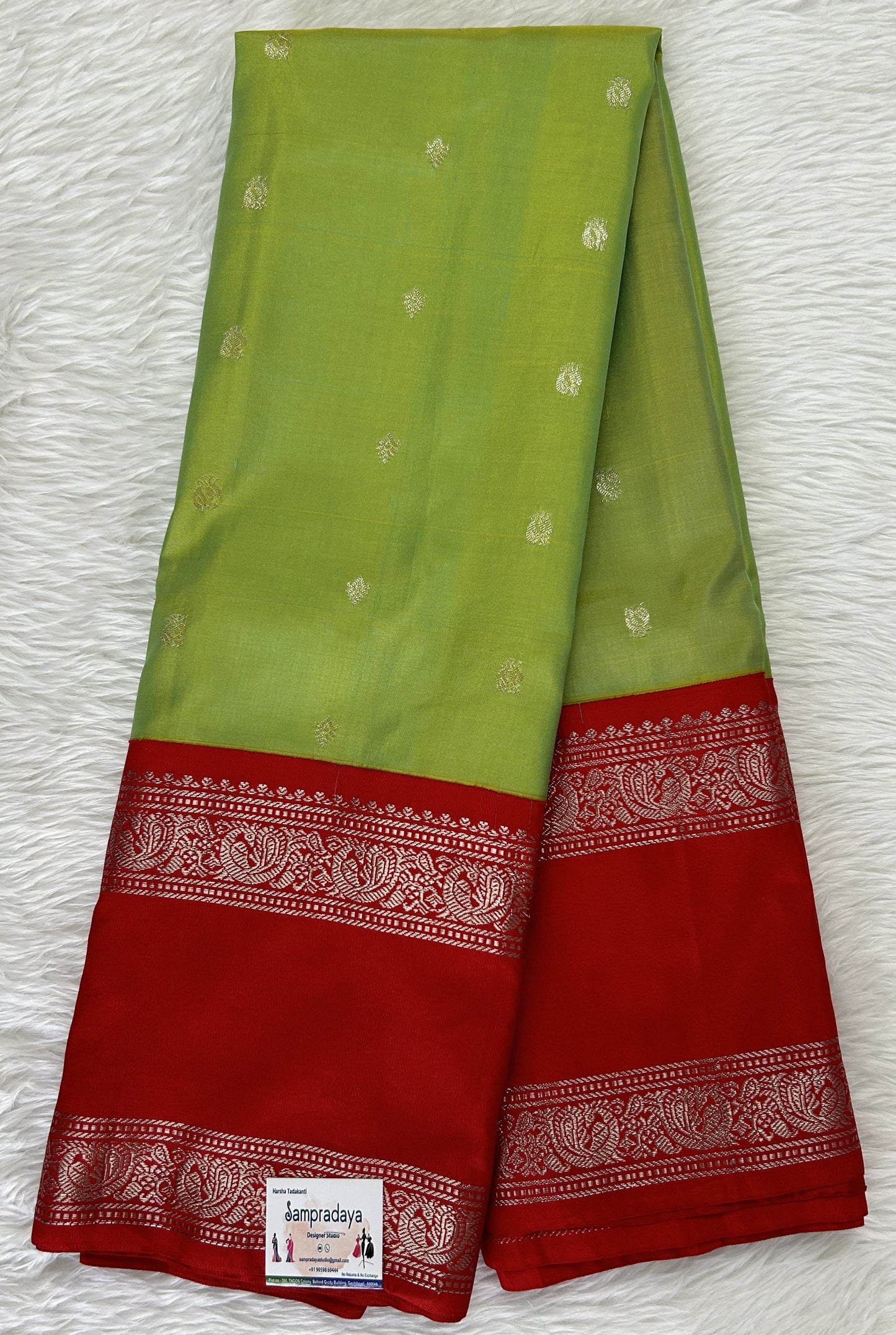 Gadwal Pattu Saree Avocado Green colored saree complemented with a Red Kanchi Gap Border - Sampradaya Designer Studio