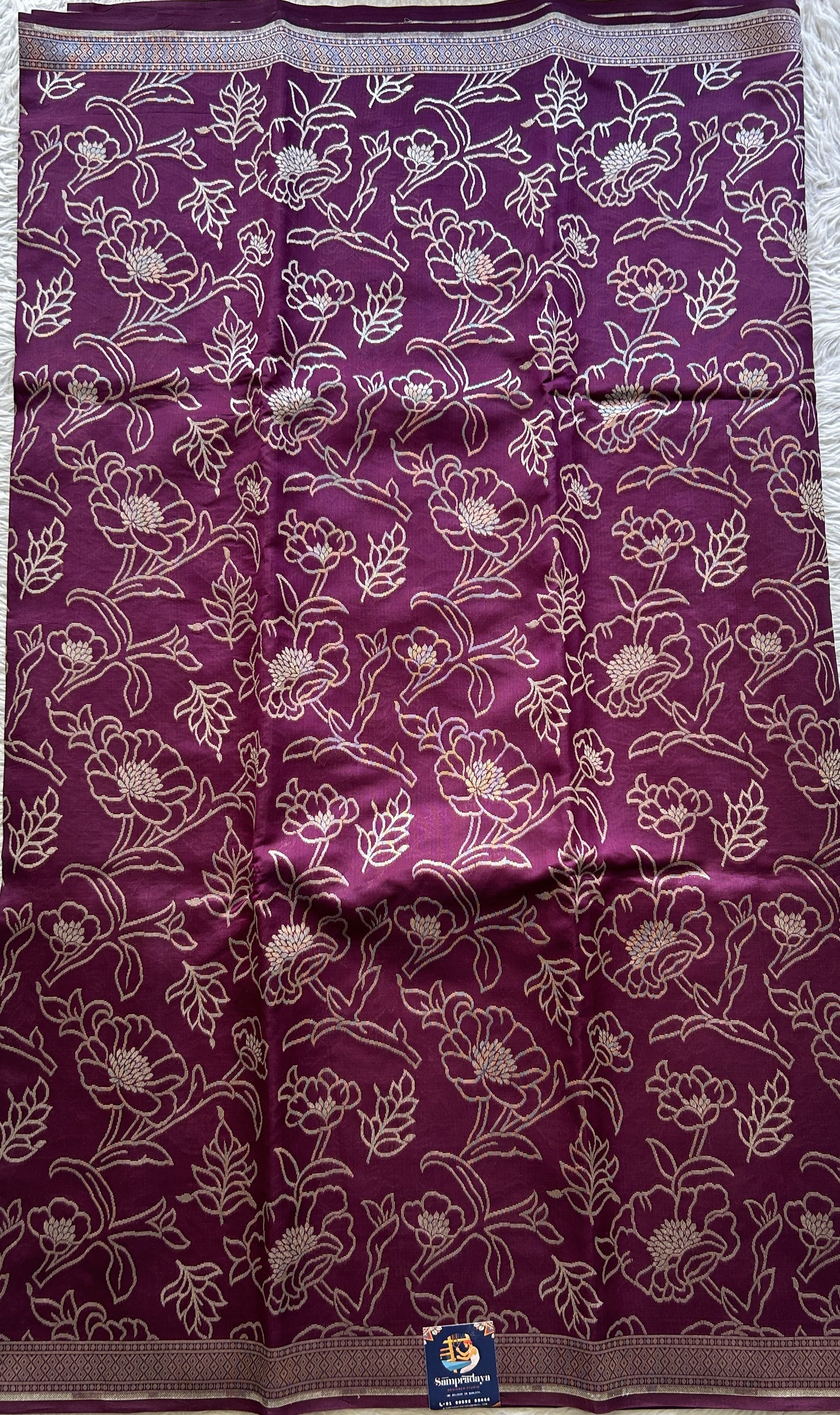 Banarasi Katan Silk Allover Saree Brinjal Colored Elegantly Paired with a Zari border. - Sampradaya Designer Studio