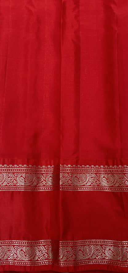 Gadwal Pattu Saree Avocado Green colored saree complemented with a Red Kanchi Gap Border - Sampradaya Designer Studio