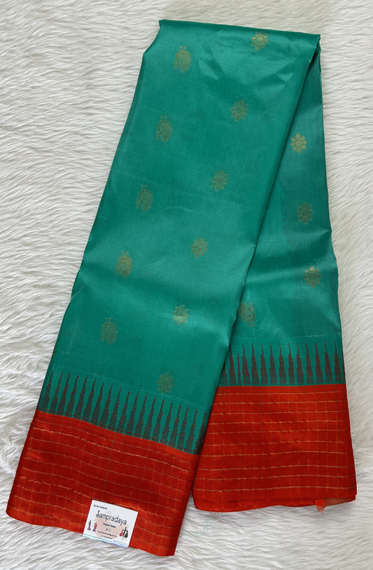 Gadwal Pattu Saree Sea Green colored saree complemented with a Orange Checks Border - Sampradaya Designer Studio