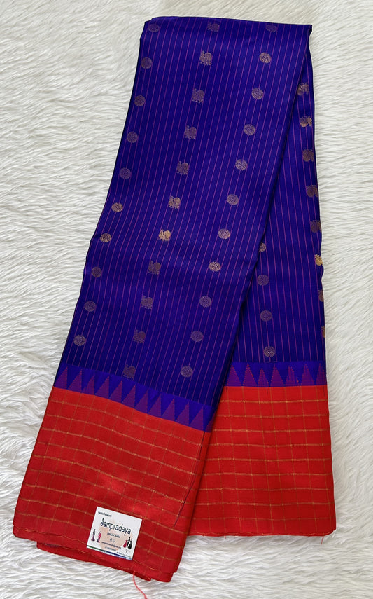 Gadwal Pattu Saree Dark Purple colored saree complemented with a Red Checks Border - Sampradaya Designer Studio