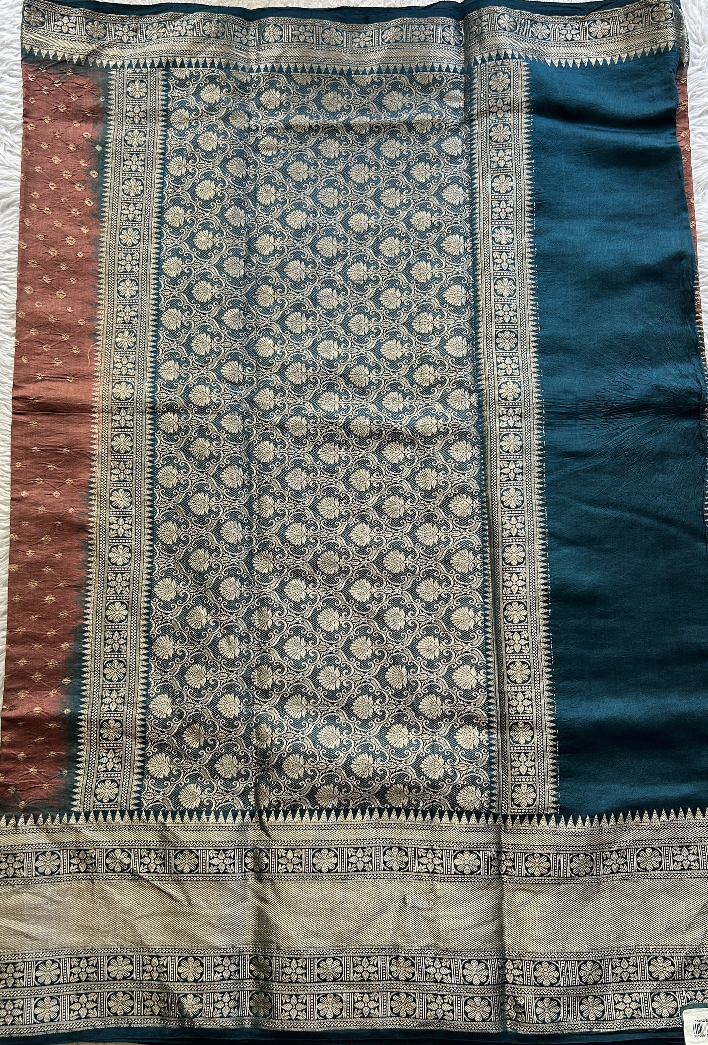 Bandhani Saree Rust Colored Elegantly Paired with a Teal Blue Color Zari Border. - Sampradaya Designer Studio
