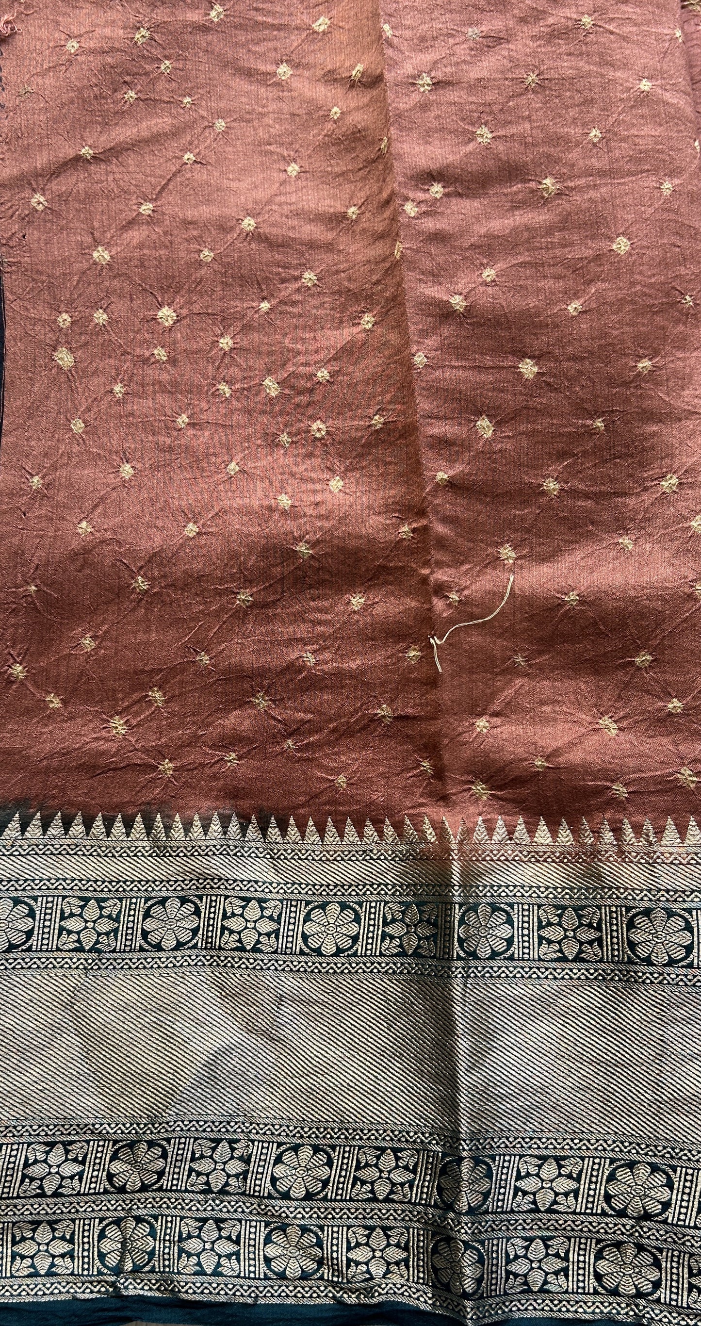 Bandhani Saree Rust Colored Elegantly Paired with a Teal Blue Color Zari Border. - Sampradaya Designer Studio