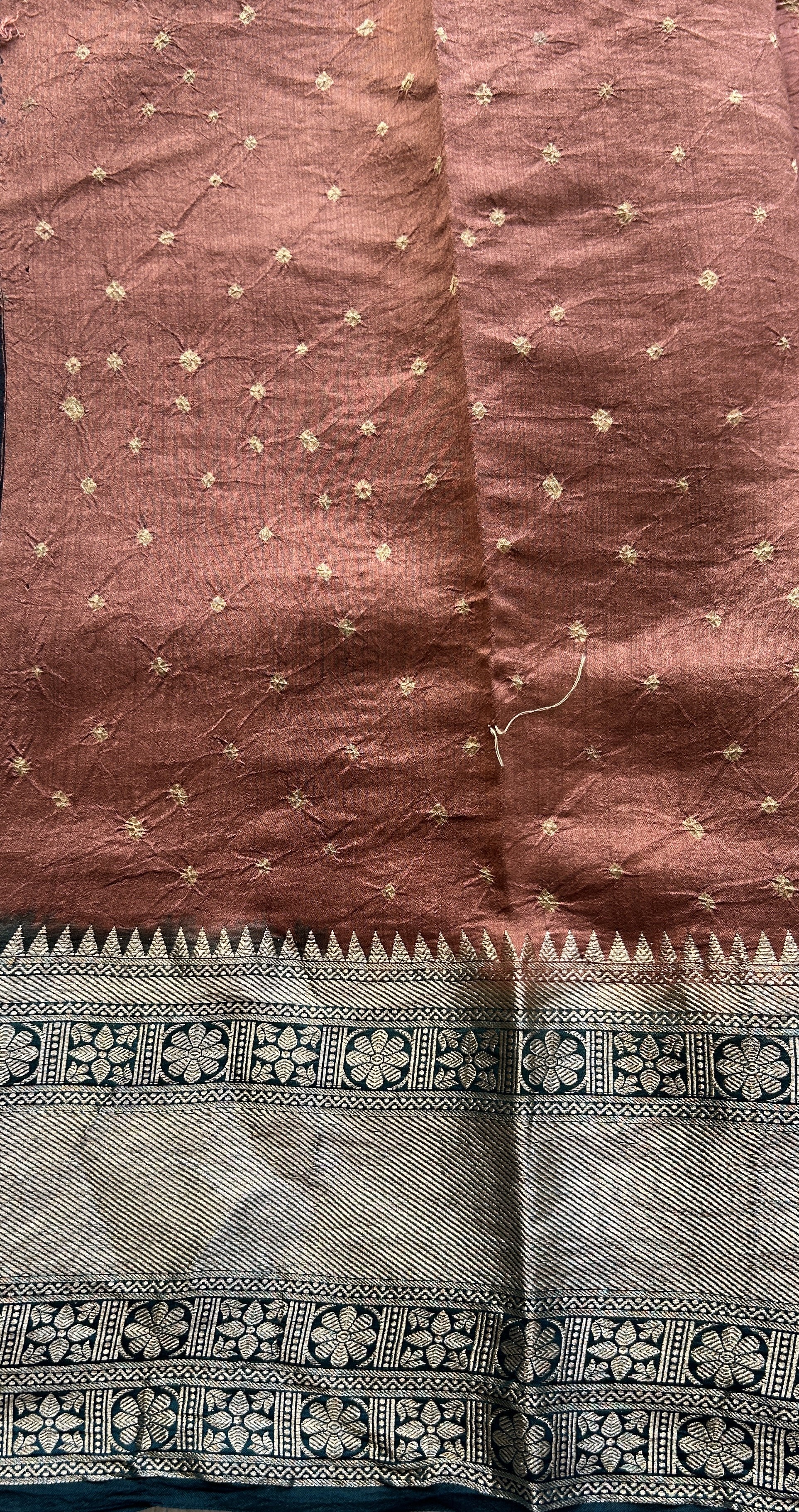 Bandhani Saree Rust Colored Elegantly Paired with a Teal Blue Color Zari Border. - Sampradaya Designer Studio