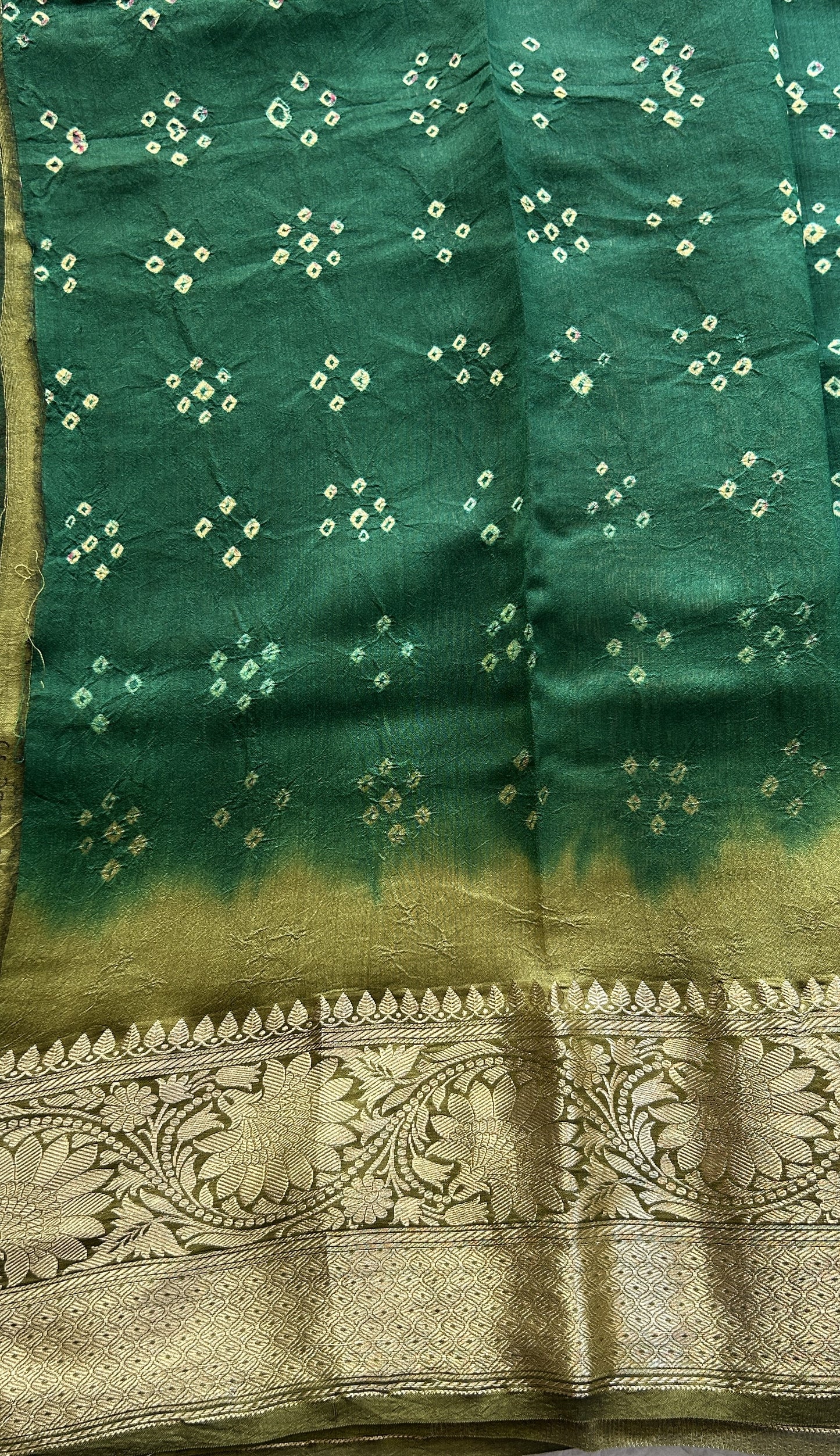 Bandhani Saree Dark Green Colored Elegantly Paired with a Olive Green Color Zari Border. - Sampradaya Designer Studio