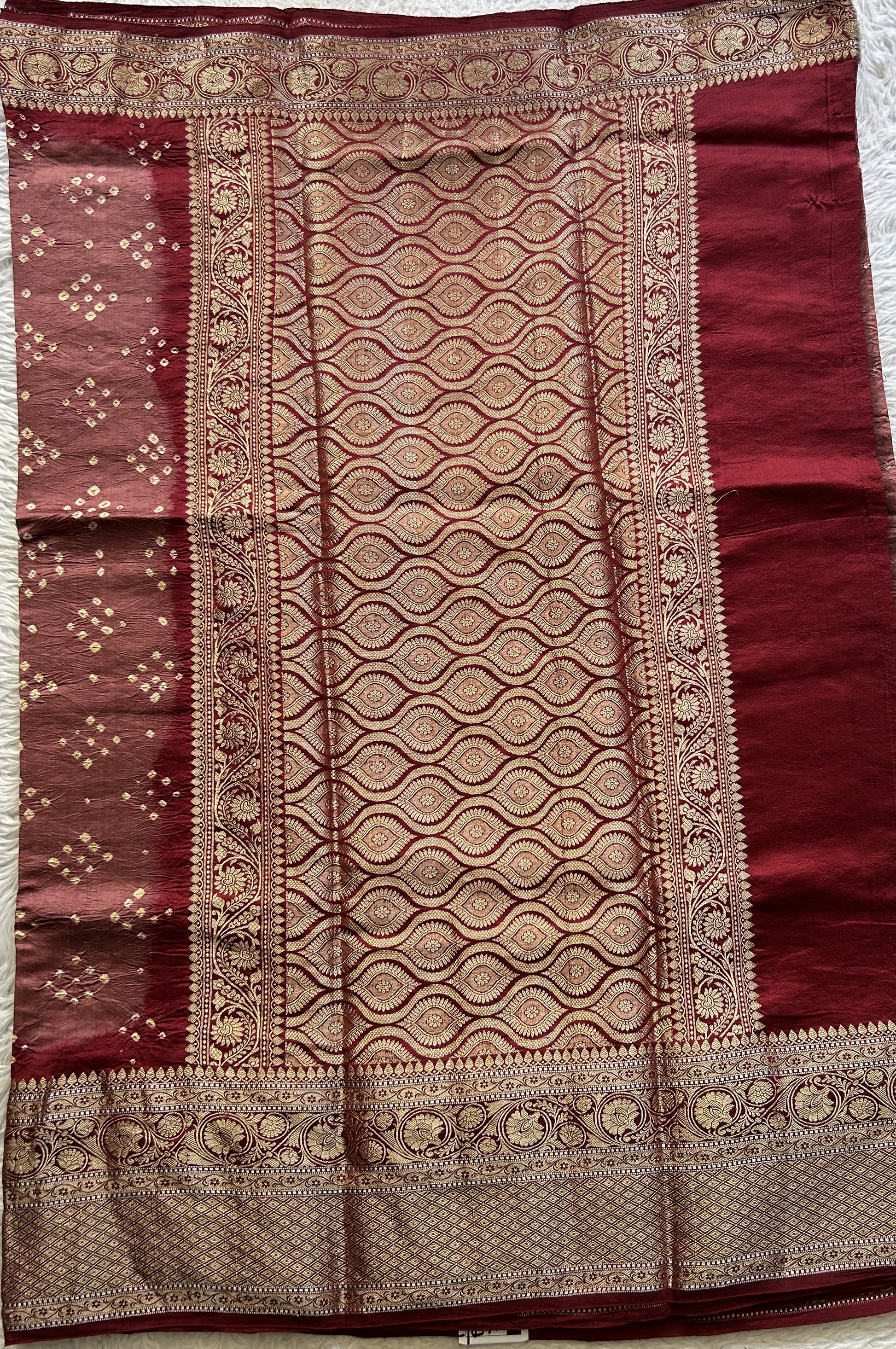 Bandhani Saree Maroon Colored Elegantly Paired with a Zari Border. - Sampradaya Designer Studio