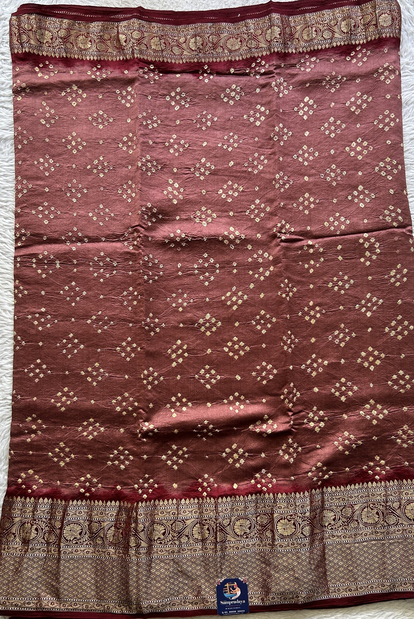 Bandhani Saree Maroon Colored Elegantly Paired with a Zari Border. - Sampradaya Designer Studio