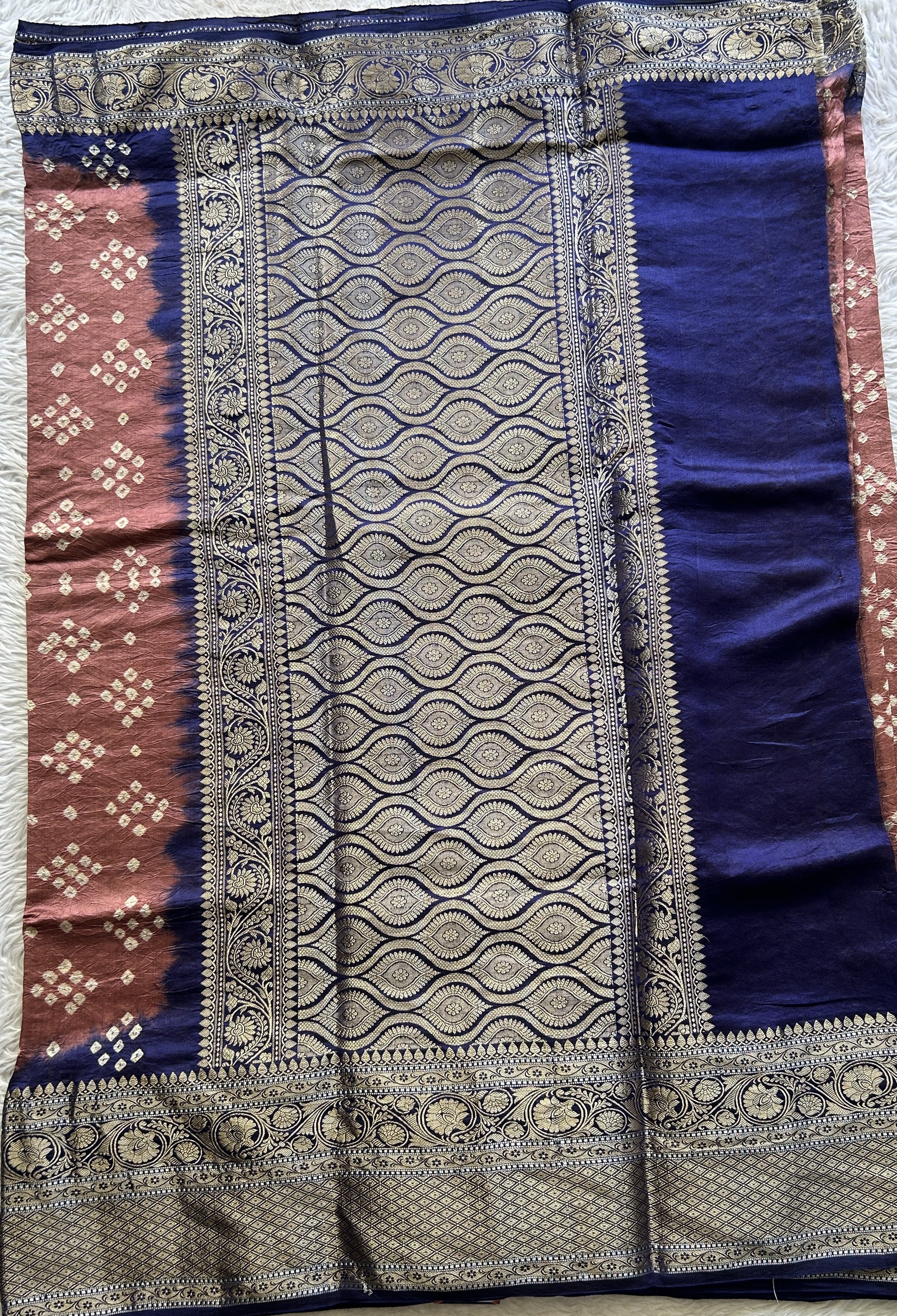 Bandhani Saree Brick Colored Elegantly Paired with a Navy Blue Color Zari Border. - Sampradaya Designer Studio