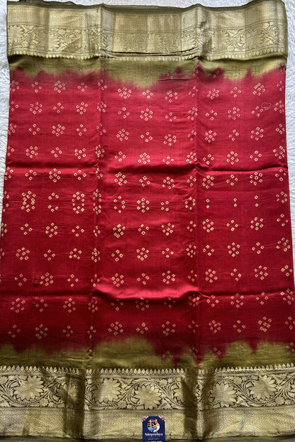 Bandhani Saree Red Colored Elegantly Paired with a Olive Green Color Zari Border. - Sampradaya Designer Studio