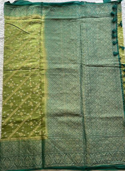 Bandhani Saree Light Green Colored Elegantly Paired with aGreen Color Zari Border. - Sampradaya Designer Studio