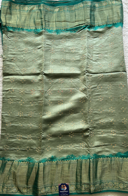 Bandhani Saree Miami Buff Colored Elegantly Paired with a Rama Green Color Zari Border. - Sampradaya Designer Studio