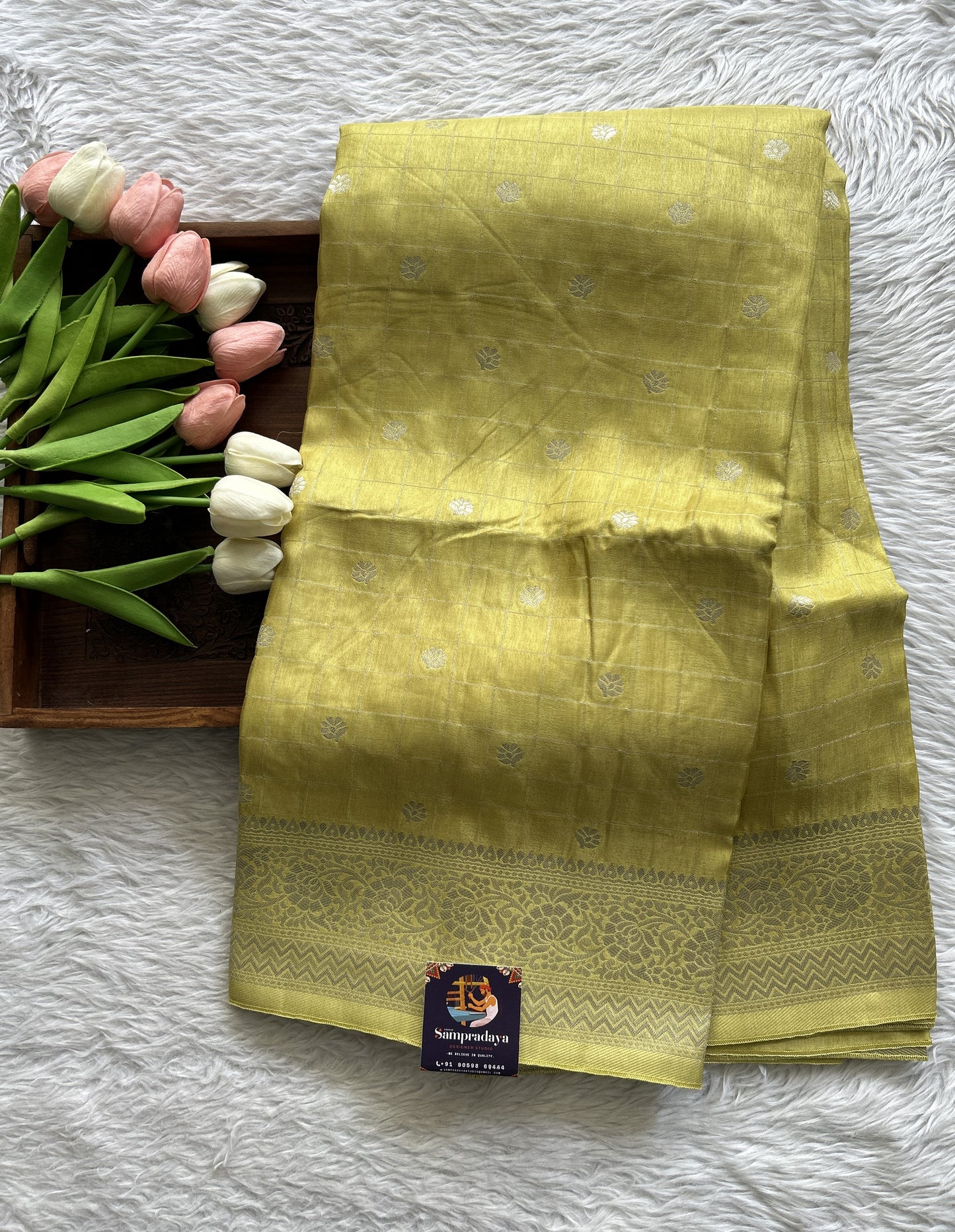 Semi Georgette Saree Yellow Colored Complemented with a Zari Border. - Sampradaya Designer Studio