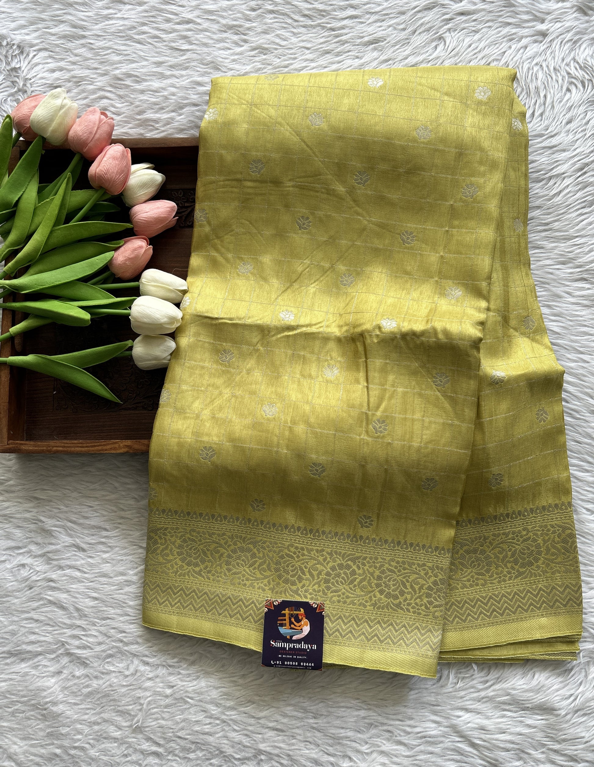 Semi Georgette Saree Yellow Colored Complemented with a Zari Border. - Sampradaya Designer Studio