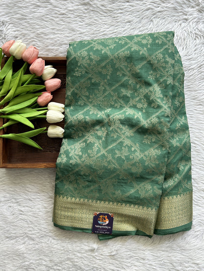 Semi Georgette Saree Green Colored Complemented with a Zari Border. - Sampradaya Designer Studio