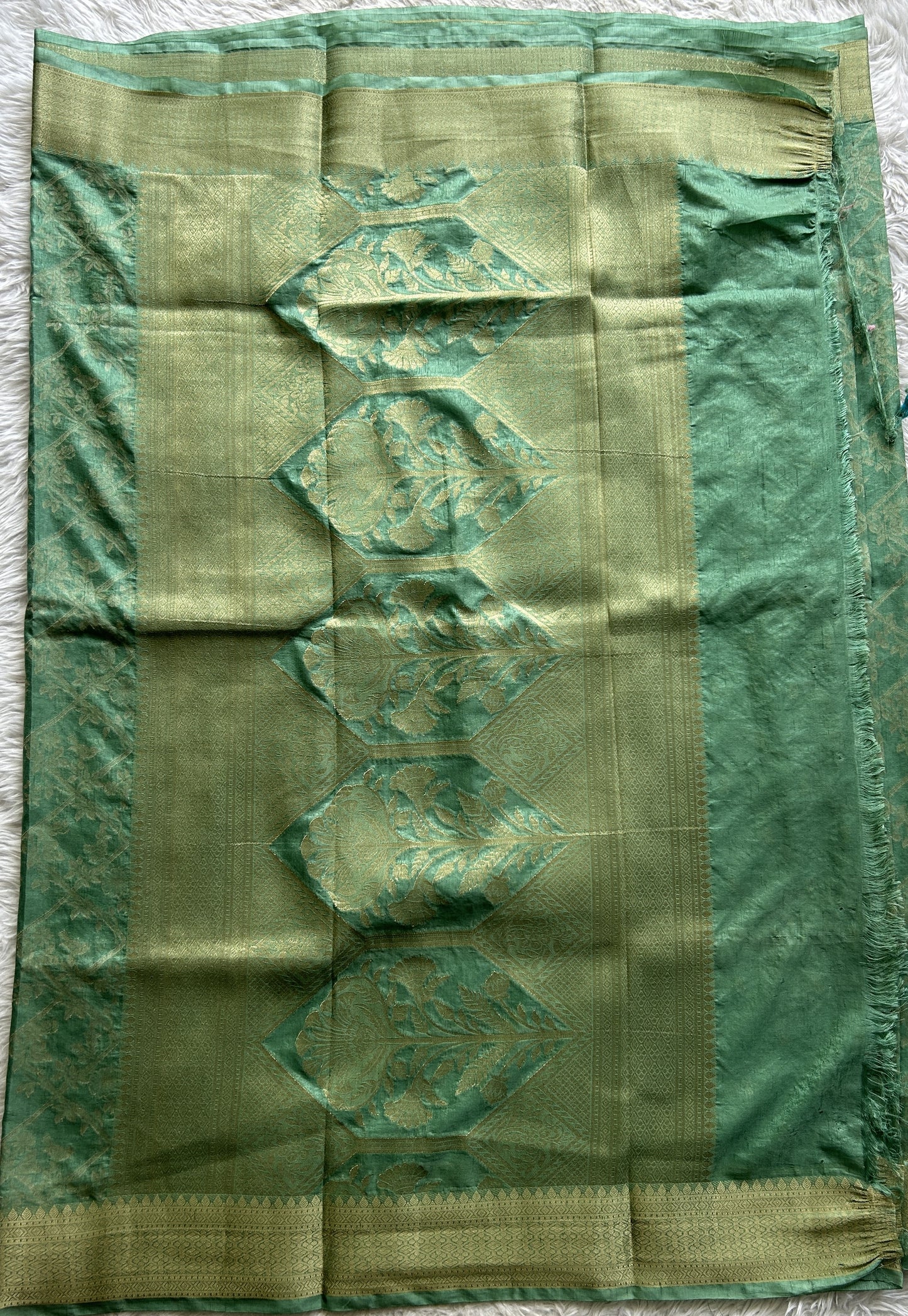 Semi Georgette Saree Light Green Colored Complemented with a Zari Border. - Sampradaya Designer Studio