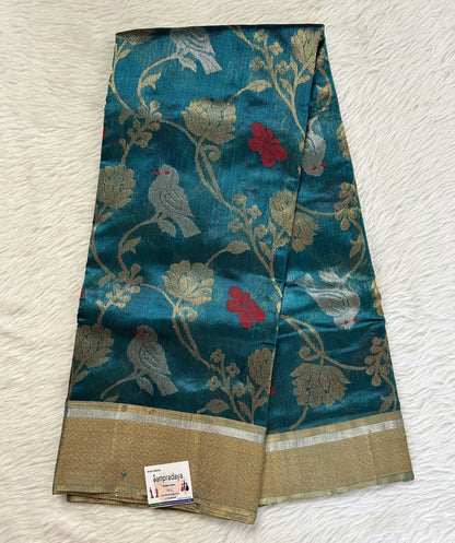 Chanderi Pattu Saree Teal Blue colored saree complemented with a Gold Zari border - Sampradaya Designer Studio