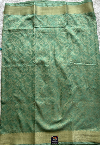 Semi Georgette Saree Light Green Colored Complemented with a Zari Border. - Sampradaya Designer Studio