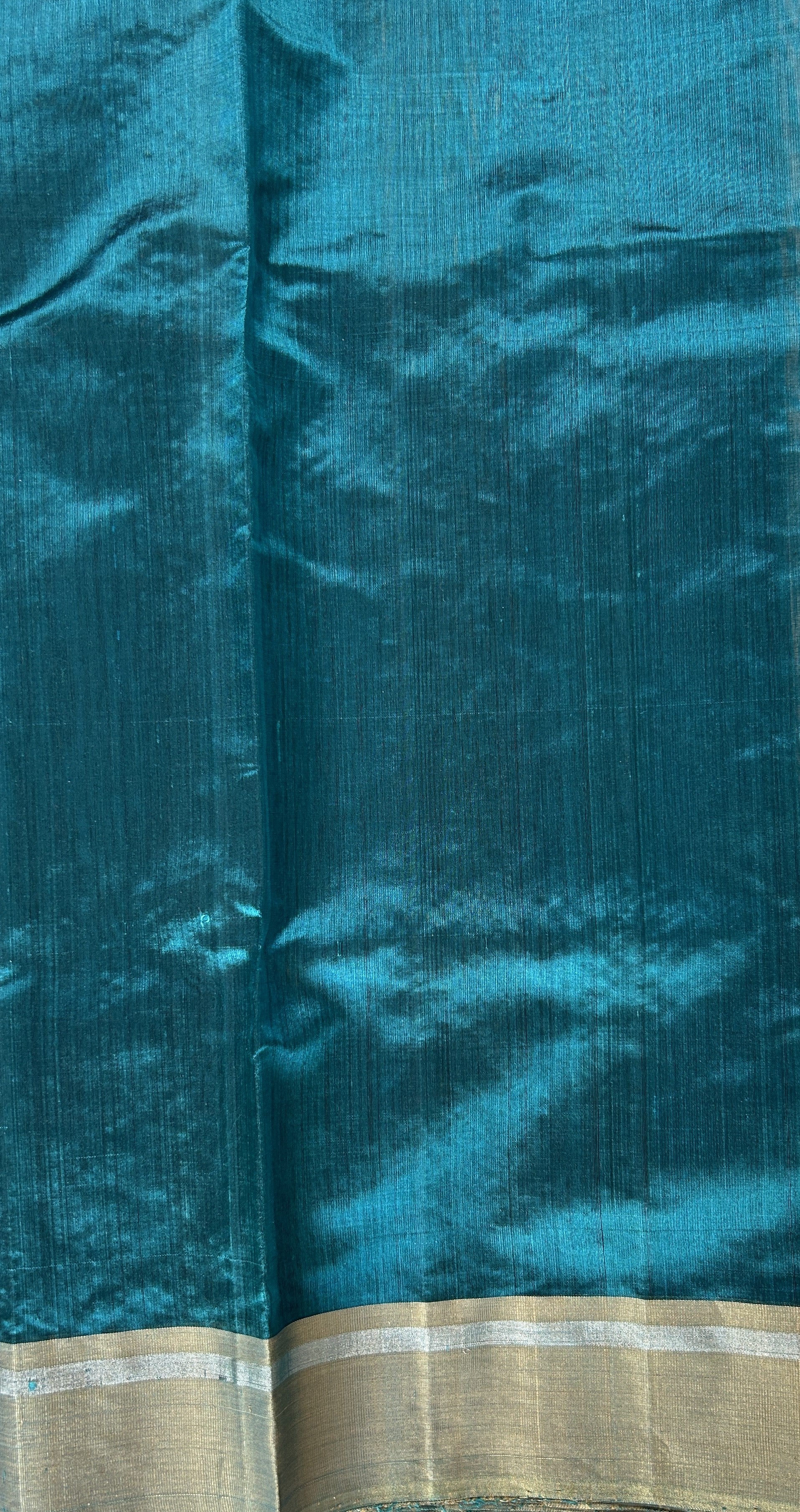 Chanderi Pattu Saree Teal Blue colored saree complemented with a Gold Zari border - Sampradaya Designer Studio