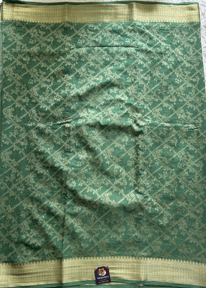 Semi Georgette Saree Green Colored Complemented with a Zari Border. - Sampradaya Designer Studio