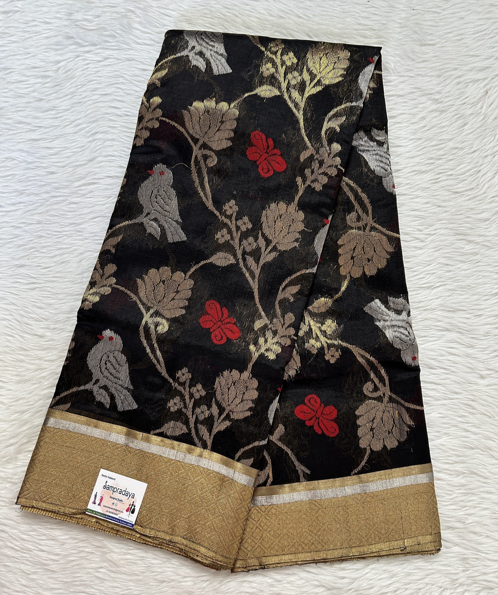 Chanderi Pattu Saree Black colored saree complemented with a Gold Zari border - Sampradaya Designer Studio