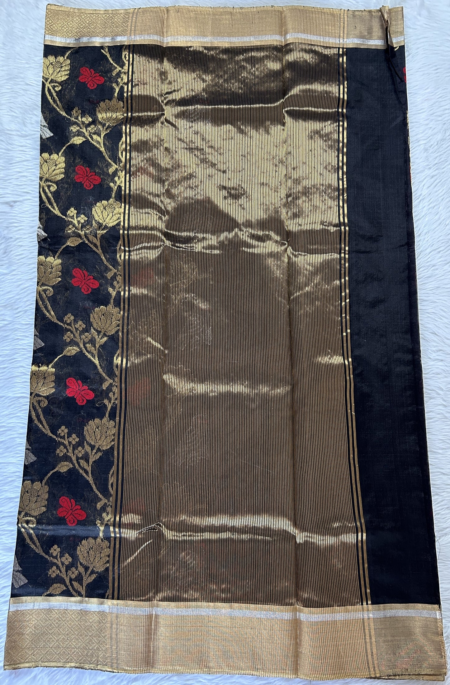 Chanderi Pattu Saree Black colored saree complemented with a Gold Zari border - Sampradaya Designer Studio