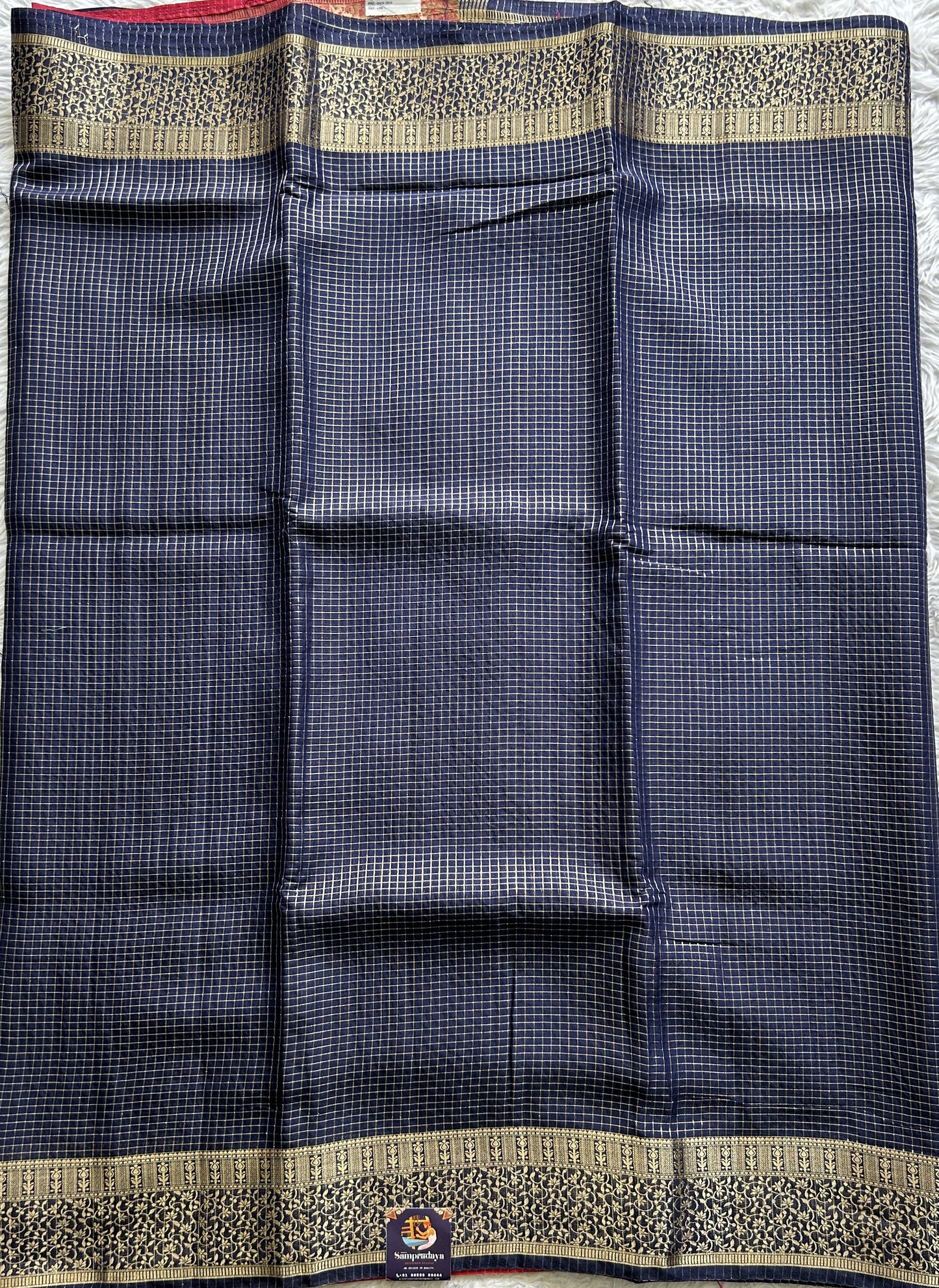 Semi Georgette Saree Navy Blue Colored Complemented with a Zari Border. - Sampradaya Designer Studio
