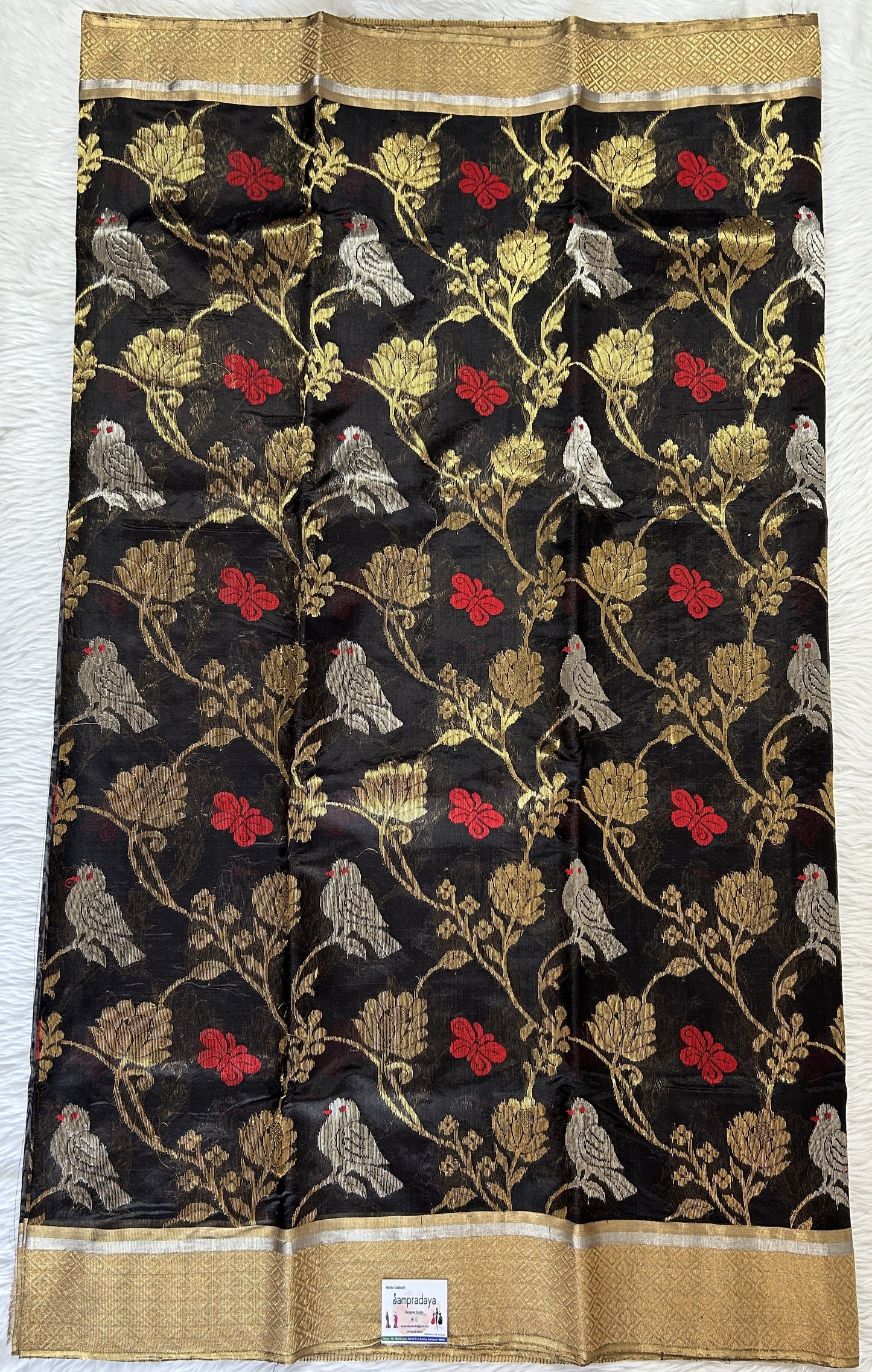 Chanderi Pattu Saree Black colored saree complemented with a Gold Zari border - Sampradaya Designer Studio