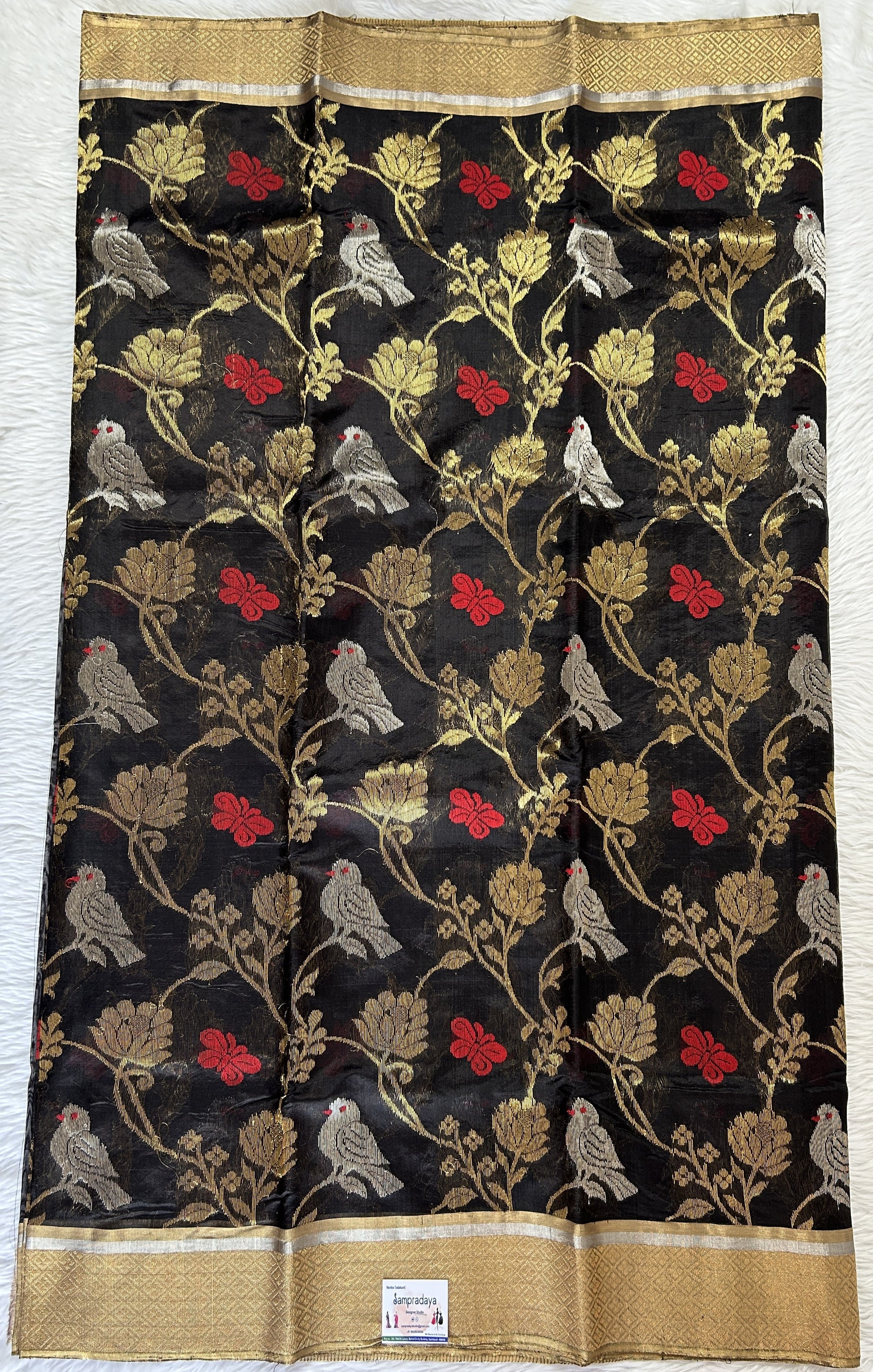 Chanderi Pattu Saree Black colored saree complemented with a Gold Zari border - Sampradaya Designer Studio