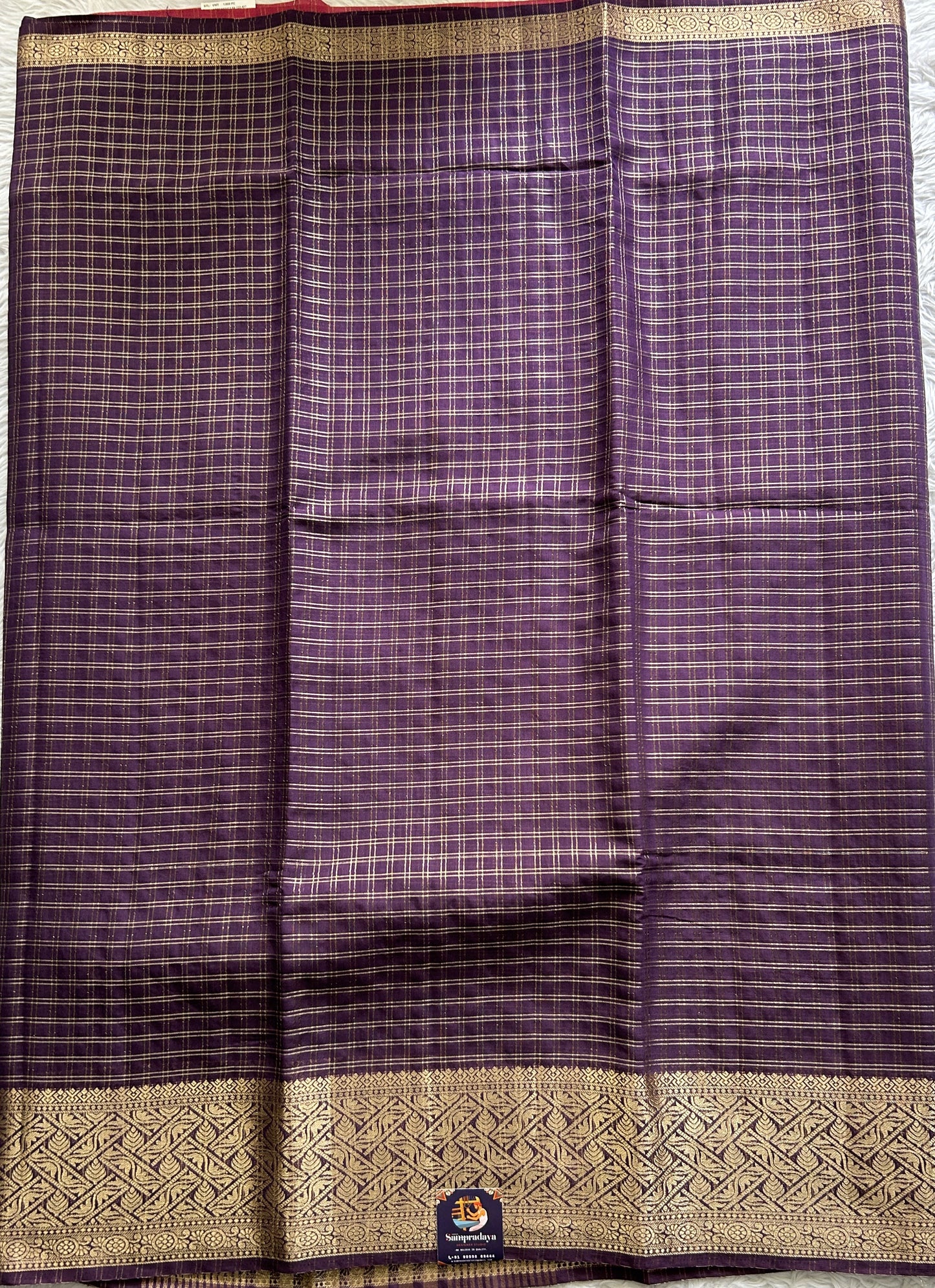 Semi Georgette Saree Purple Colored Complemented with a Zari Border. - Sampradaya Designer Studio