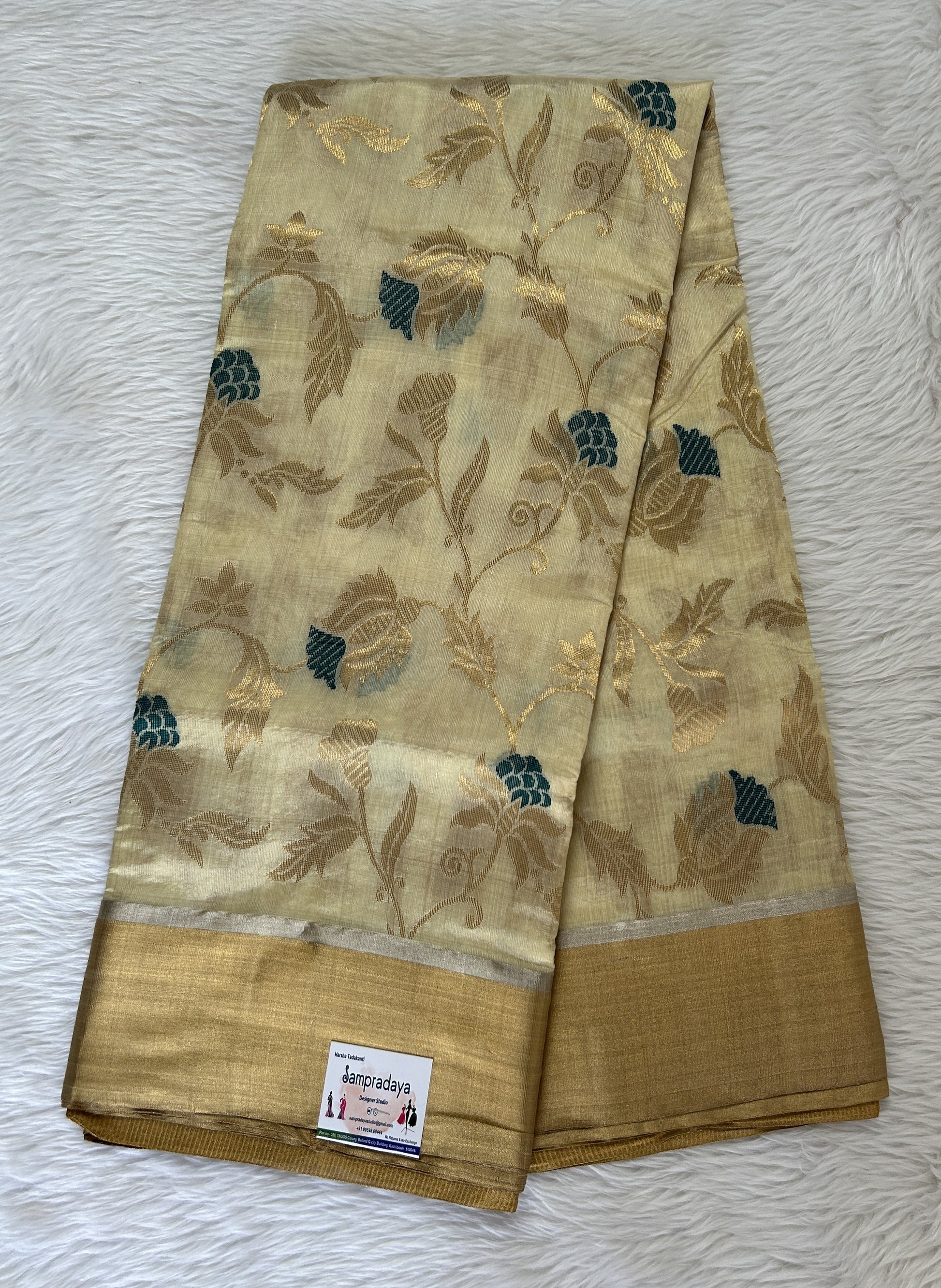 Chanderi Pattu Saree Cream colored saree complemented with a Gold Zari border - Sampradaya Designer Studio