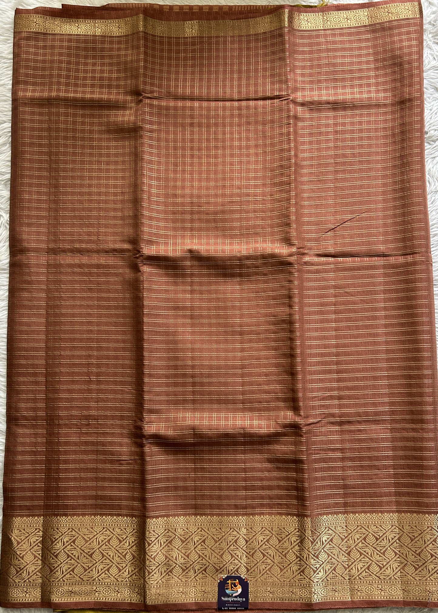 Semi Georgette Saree Light Brown Colored Complemented with a Zari Border. - Sampradaya Designer Studio