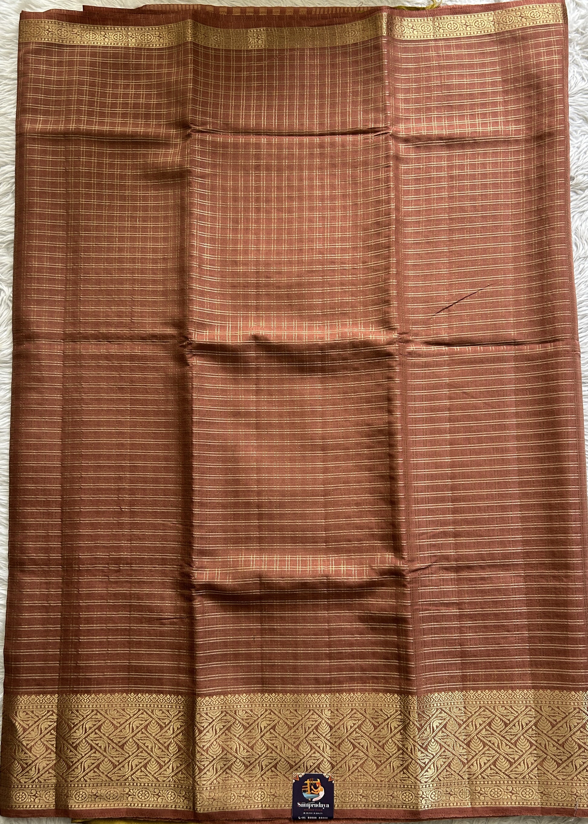 Semi Georgette Saree Light Brown Colored Complemented with a Zari Border. - Sampradaya Designer Studio
